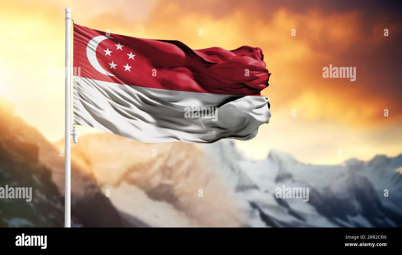 Flag of Singapore on a flagpole against a colorful sky Stock Photo Alamy