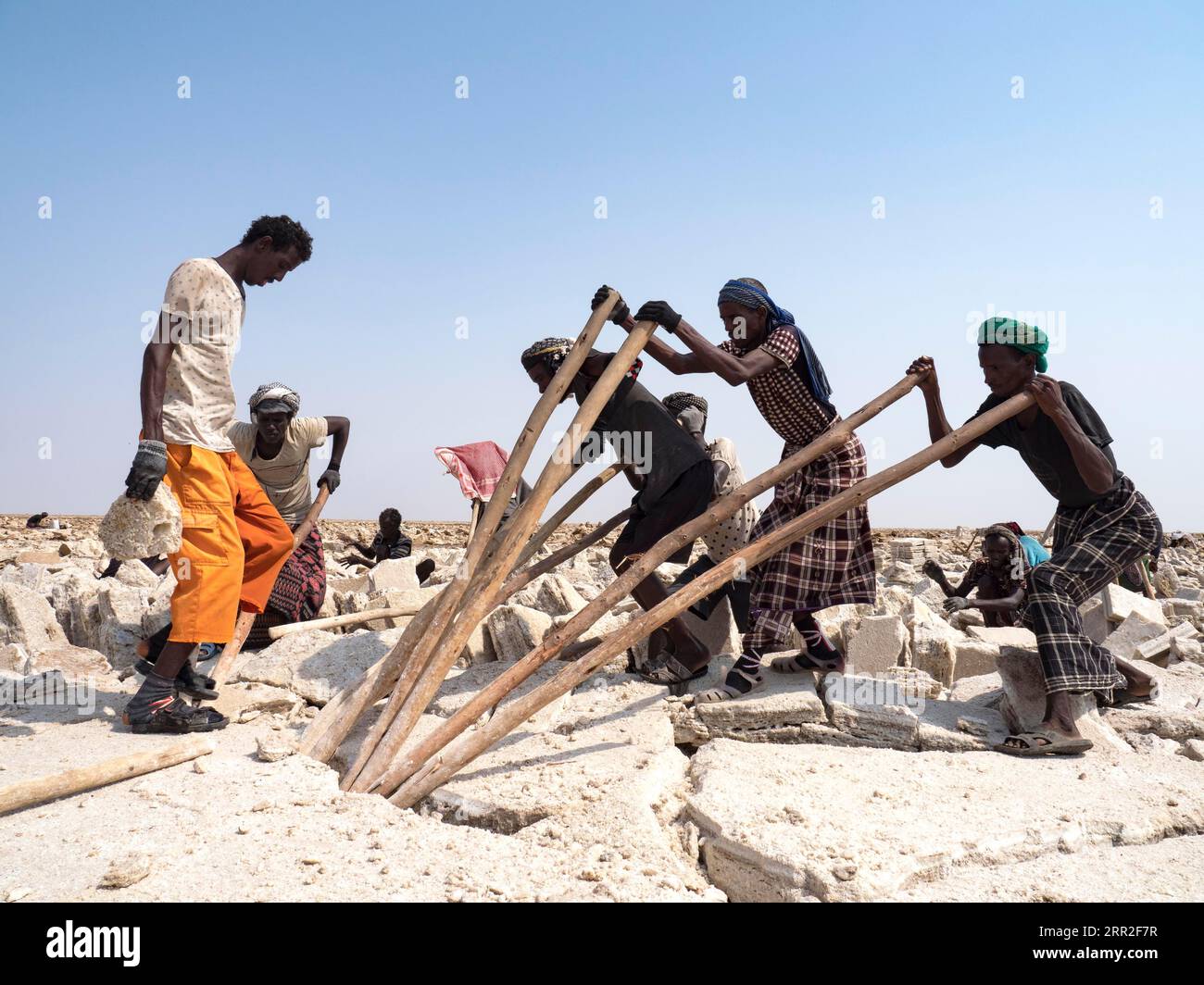 Salt extraction, workers mining salt, Dallol, Danakil Desert, Ethiopia