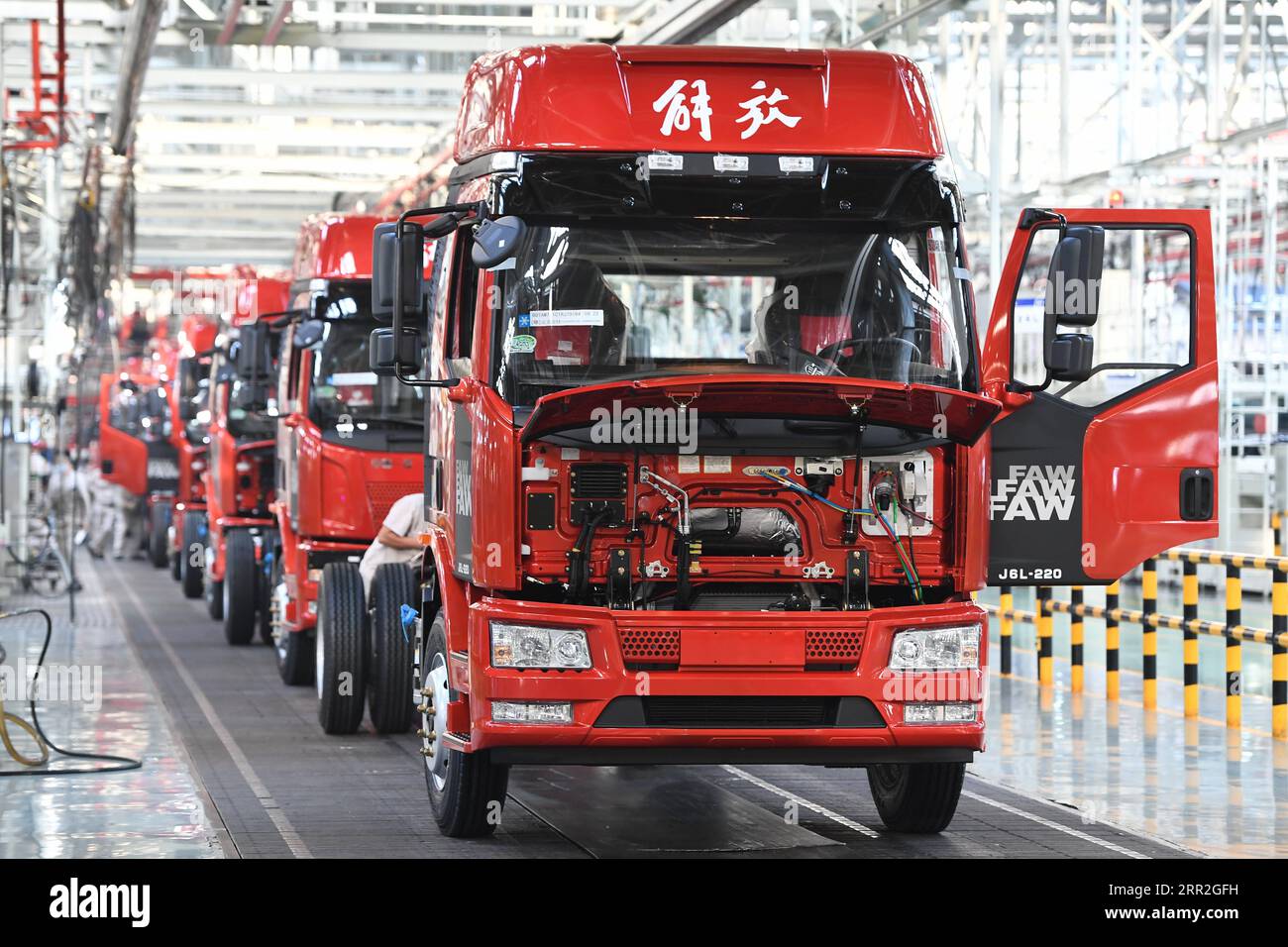 201012 -- CHANGCHUN, Oct. 12, 2020 -- Vehicles wait for assembling at a factory of the First Automotive Works FAW Group Co., Ltd. in Changchun, capital of northeast China s Jilin Province, Sept. 23, 2020. China s leading automaker First Automotive Works FAW Group Co., Ltd. sold 2,656,744 vehicles in the first three quarters of the year, up 8 percent year on year, according to corporate sources.  CHINA-CHANGCHUN-FAW-SALES-GROWTH CN ZhangxNan PUBLICATIONxNOTxINxCHN Stock Photo