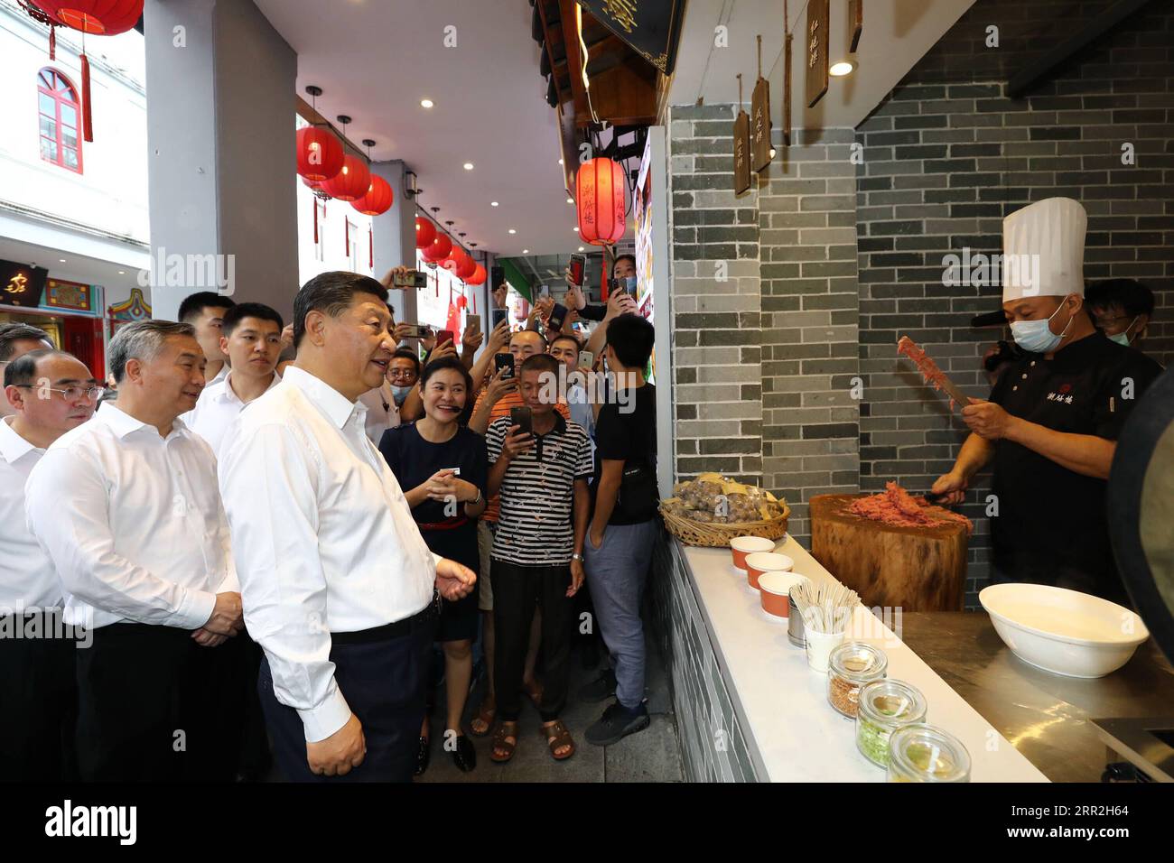201012 -- CHAOZHOU, Oct. 12, 2020 -- Chinese President Xi Jinping, also general secretary of the Communist Party of China Central Committee and chairman of the Central Military Commission, visits a street lined with ancient memorial archways to check the development of cultural and tourism resources in Chaozhou, south China s Guangdong Province, Oct. 12, 2020. Xi on Monday arrived in Guangdong to begin an inspection tour of the province.  CHINA-GUANGDONG-XI JINPING-INSPECTION CN JuxPeng PUBLICATIONxNOTxINxCHN Stock Photo