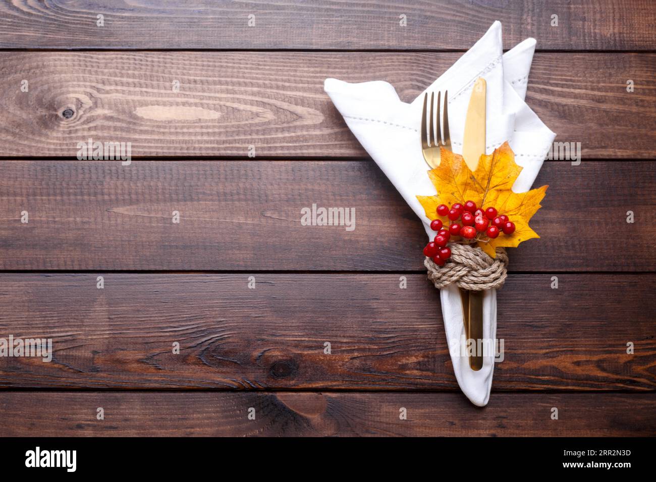 Autumn table setting on old wooden table Thanksgiving or Octoberfest vintage background copy space Stock Photo