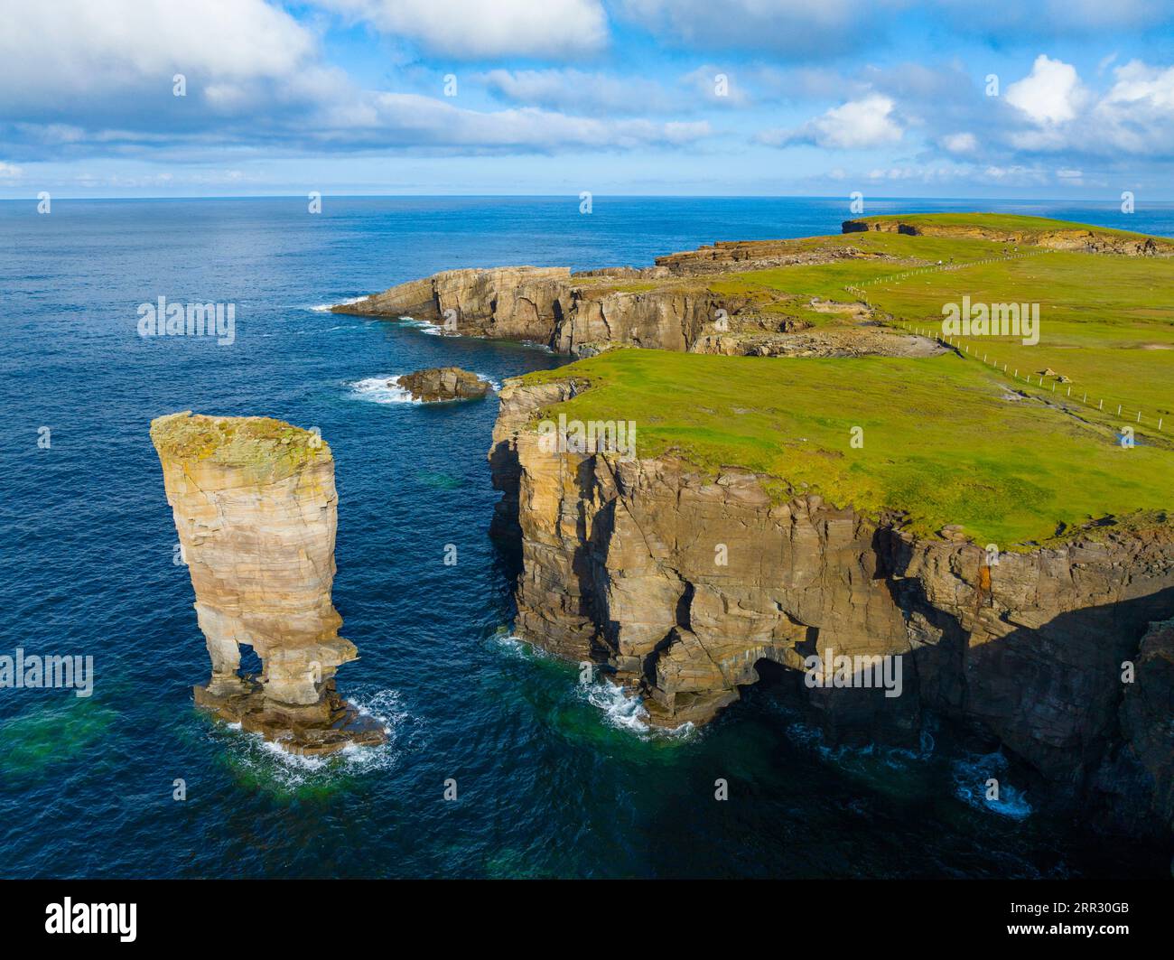 Aerial view of sea cliffs and coastal scenery  at Yesnaby Castle sea stack on West Mainland coast, Orkney Islands, Scotland, UK. Stock Photo
