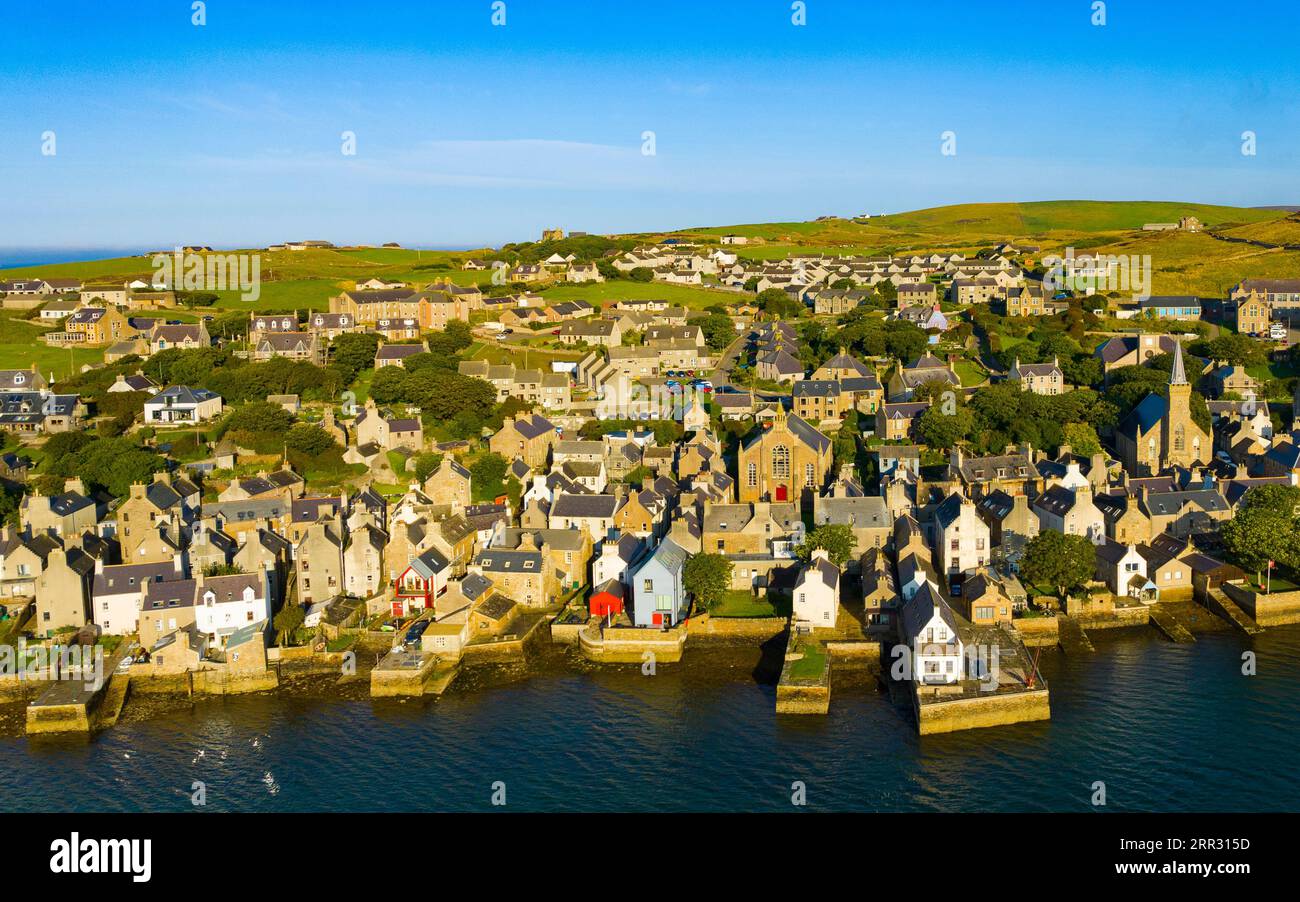 Aerial view of Stromness waterfront in early morning light  on West Mainland, Orkney Islands, Scotland, UK Stock Photo