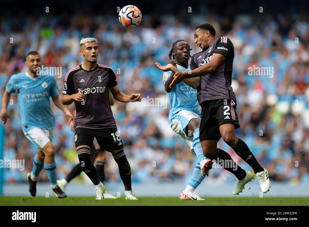 Manchester, UK. 02nd Sep, 2023. Kenny Tete #2 of Fulham F.C heads the ball during the Premier League match between Manchester City and Fulham at the Etihad Stadium, Manchester on Saturday 2nd September 2023. (Photo by Mike Morese/MI News/NurPhoto) Credit: NurPhoto SRL/Alamy Live News Stock Photo