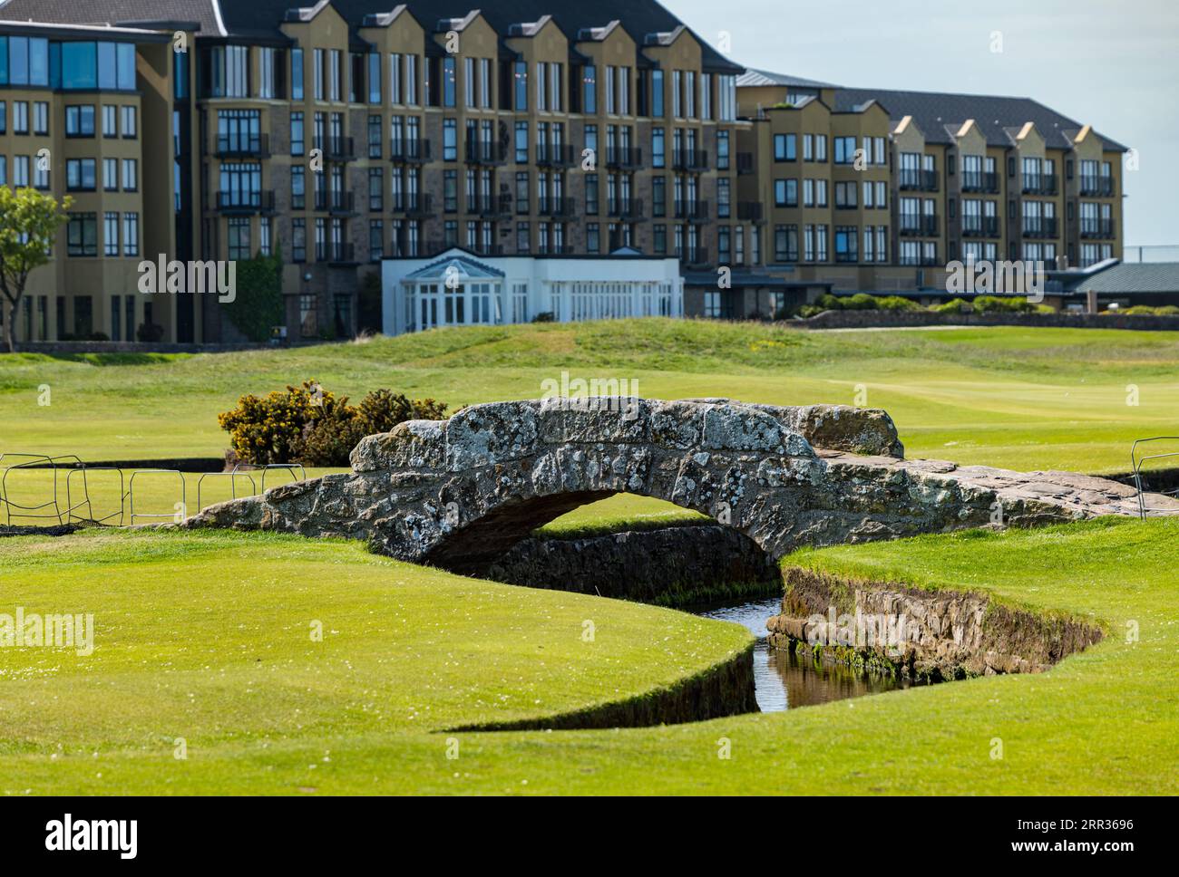 Swilcan Bridge, The Links,, Old Course with people playing golf, St Andrews, Fife, Scotland, UK Stock Photo