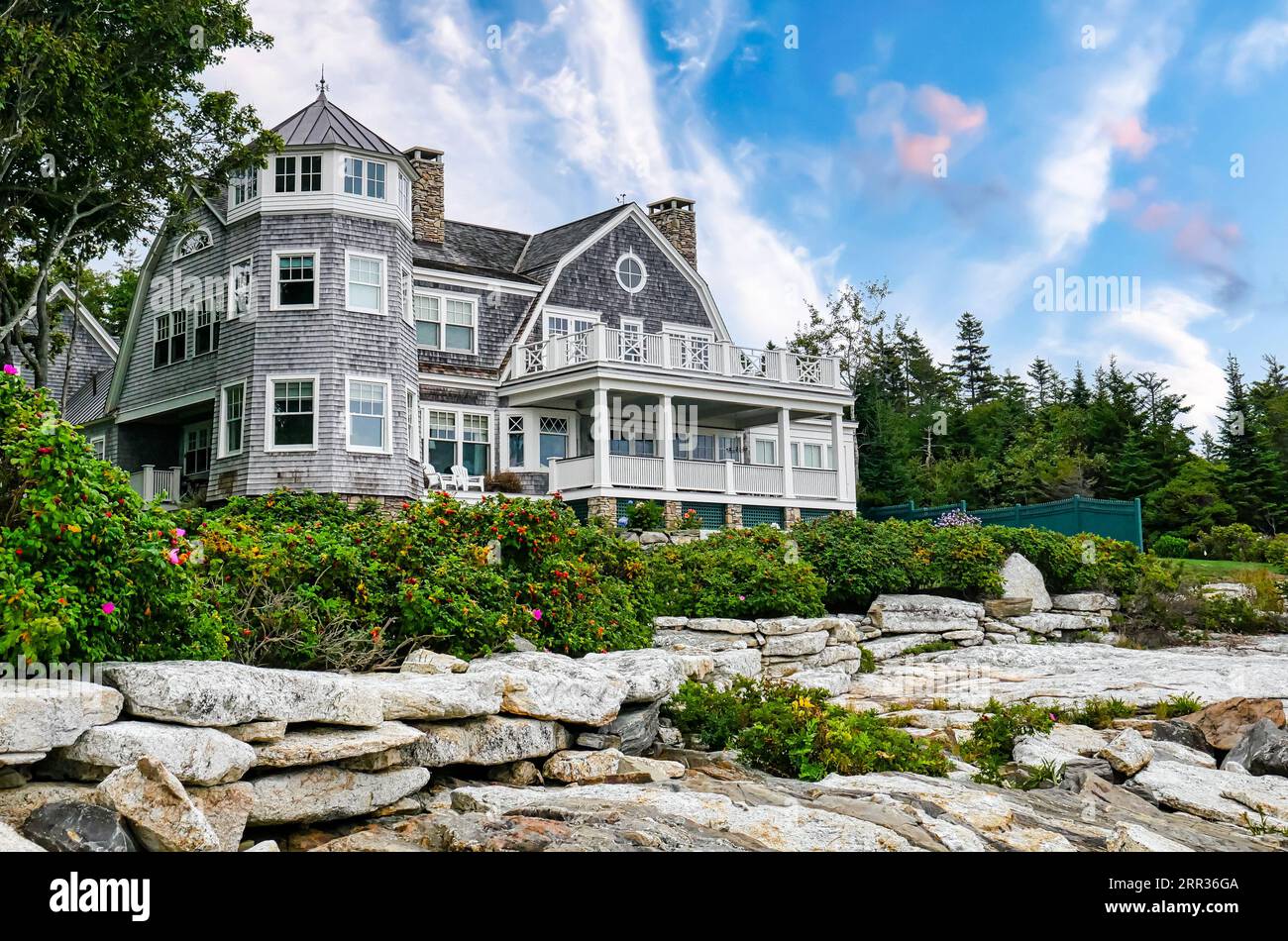 Large shingle style house on clifftop with porch, Ocean Point, Boothbay ...