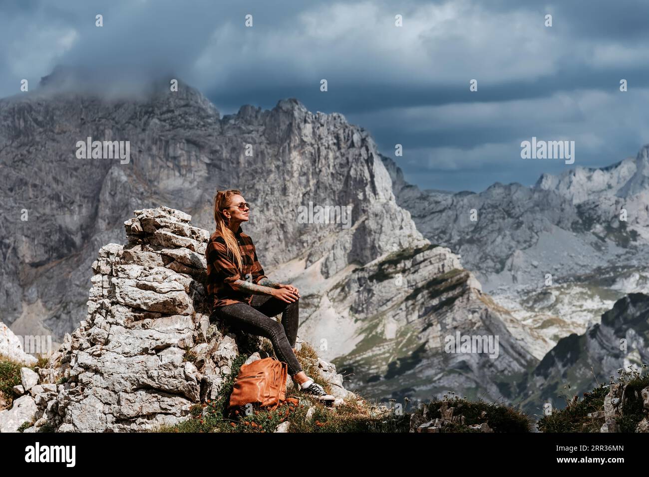 Female hiker on rock dramatic hi-res stock photography and images - Alamy