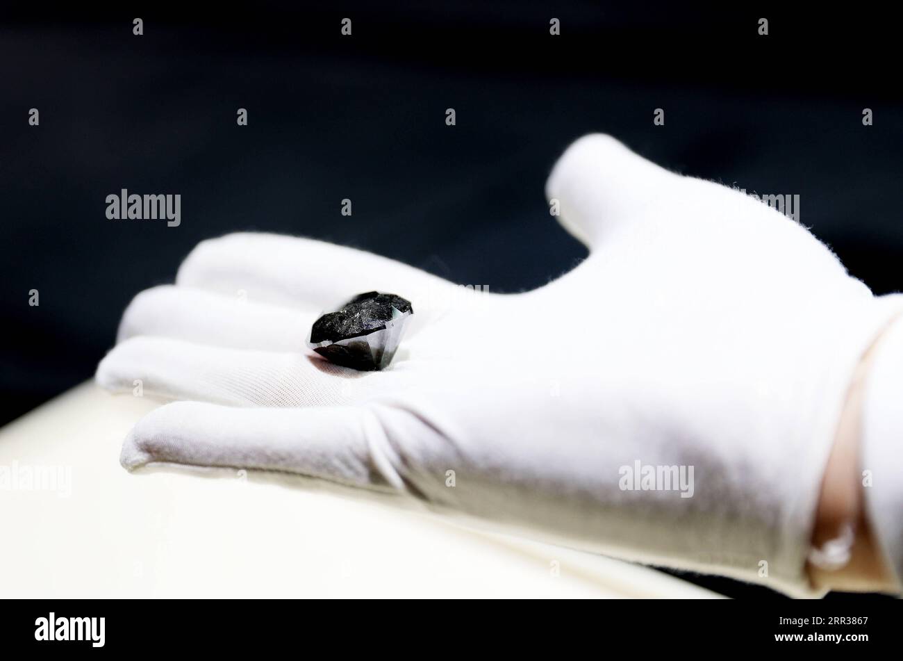 201026 -- SHANGHAI, Oct. 26, 2020 -- A black diamond weighing 88 carats is presented in Shanghai, east China, Oct. 26, 2020. With an estimated value of 37 million U.S. dollars, the diamond from Paris will be on display during the upcoming third China International Import Expo CIIE in Shanghai.  CHINA-SHANGHAI-CIIE-BLACK DIAMOND CN FangxZhe PUBLICATIONxNOTxINxCHN Stock Photo