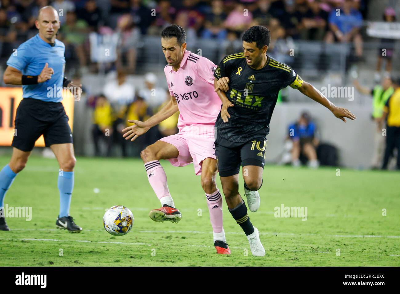 Inter Miami's Sergio Busquets (L) and Los Angeles FC's Carlos Vela (R) in action during an MLS soccer match in Los Angeles. Inter Miami CF 3:1 Los Angeles FC. Stock Photo