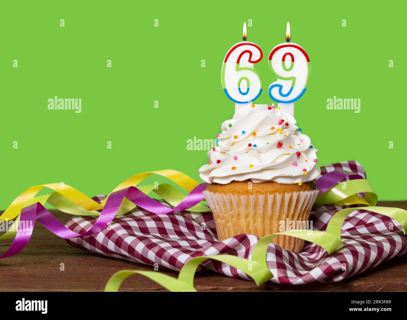 Cupcake With Number For Birthday Or Anniversary Celebration; Number 69. Stock Photo