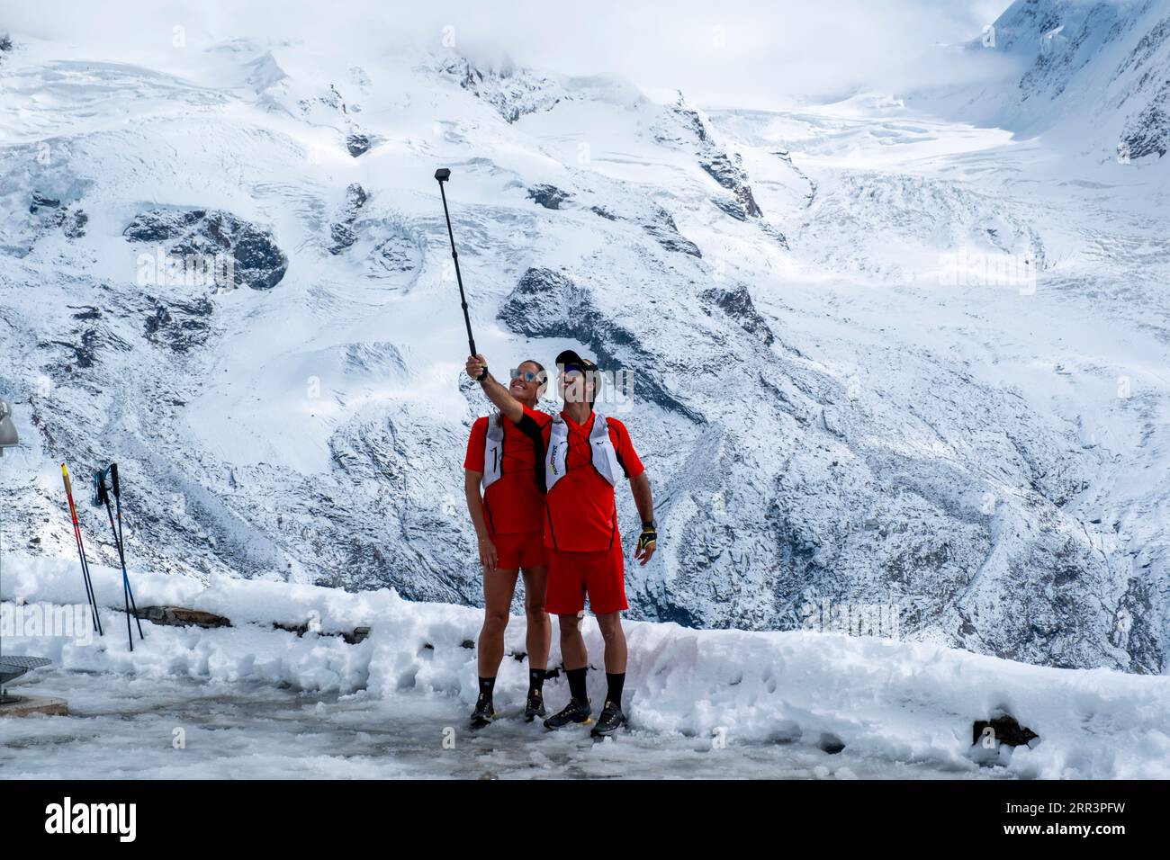 Tourists take a selfie with the Gorner Glacier and Monte Rosa massif ...