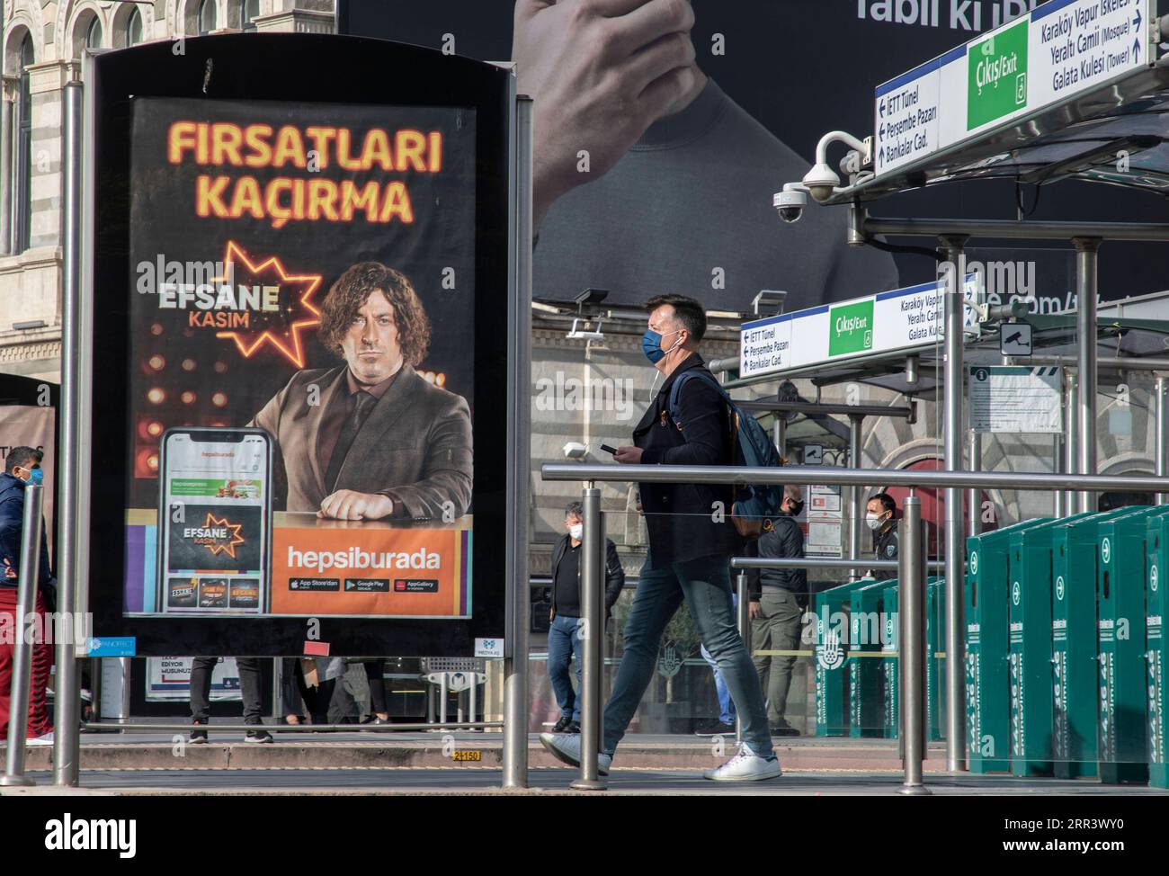 201112 -- ISTANBUL, Nov. 12, 2020 -- A man walks past a shopping website billboard in Istanbul, Turkey, on Nov. 12, 2020. Turkey expects a record e-commerce trade volume of 213 billion dollars for the year-end and 240 billion dollars in 2021, according to an official report cited by the state-run Anadolu news agency. The volume was 190 billion dollars last year. Photo by /Xinhua TO GO WITH Feature: Turkey s discount frenzy boosts e-commerce sales TURKEY-ISTANBUL-E-COMMERCE SALES-FRENZY OsmanxOrsal PUBLICATIONxNOTxINxCHN Stock Photo