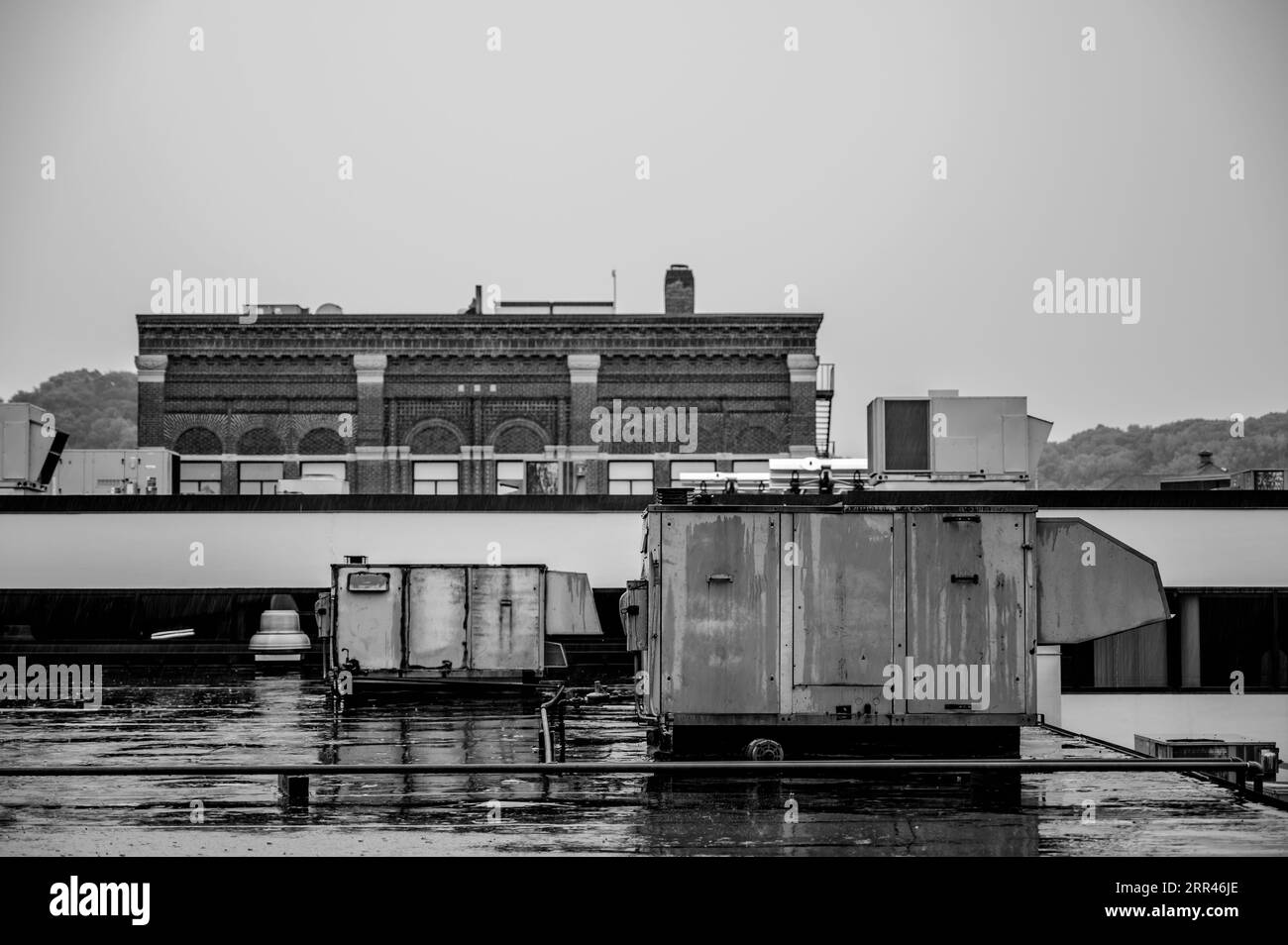 Rooftop industrial air handler during a rain storm Stock Photo Alamy