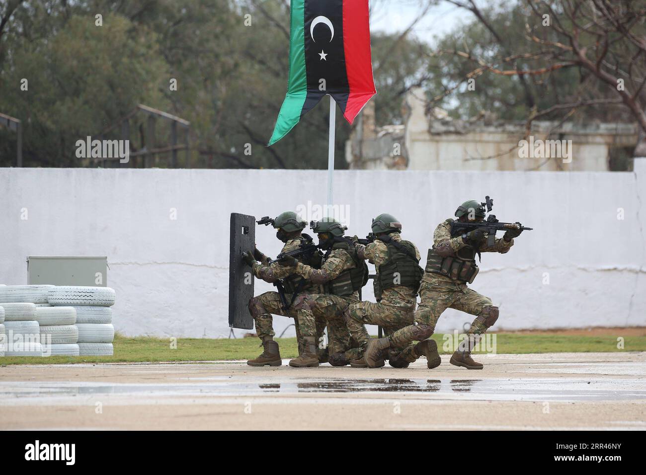 201122 -- TRIPOLI, Nov. 22, 2020 -- The special military forces of Libya s UN-backed government perform military skills on the graduation day in Omar Al-Mokhtar training center, near Tripoli, Libya, on Nov. 21, 2020. Libya s UN-backed government on Saturday announced that the first group of special military forces trained by Turkey has graduated. Photo by /Xinhua LIBYA-TRIPOLI-TURKEY-TRAINED MILITARY FORCES-GRADUATION HamzaxTurkia PUBLICATIONxNOTxINxCHN Stock Photo