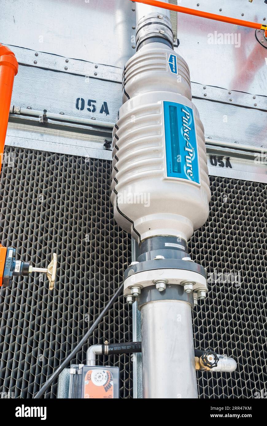 Condensor Commercial Commercial refrigeration condenser at a cold-storage facility, with a ...