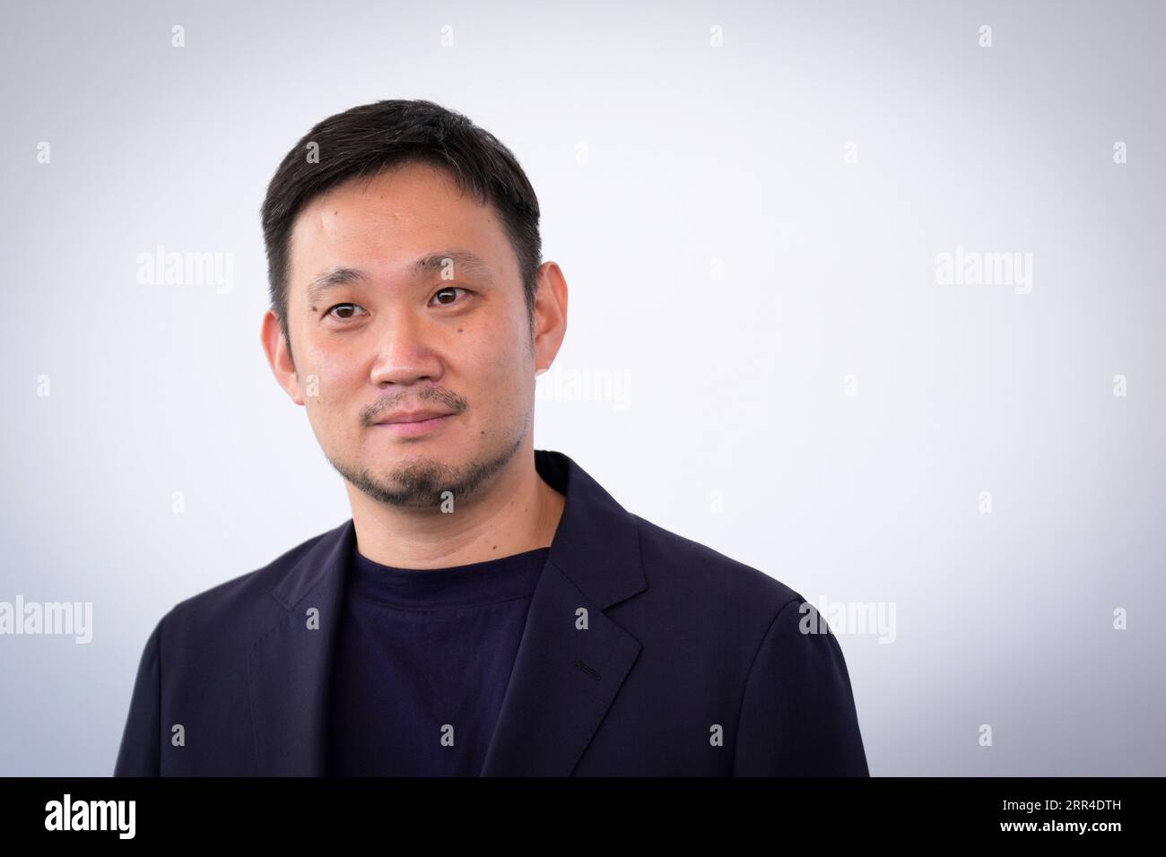 Venice, Italy. 04th Sep, 2023. Director Ryusuke Hamaguchi during the photocall of the movie ''Aku Wa Sonzai Shinai (Evil Does Not Exist)'' presented in competition at the 80th Venice Film Festival on September 4, 2023 at Venice Lido (Photo by Daniele Cifala/NurPhoto) Credit: NurPhoto SRL/Alamy Live News Stock Photo