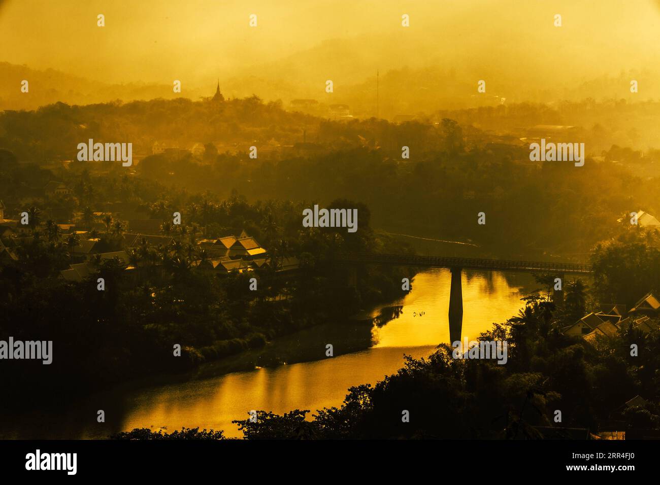 201203 -- LUANG PRABANG, Dec. 3, 2020 -- Photo taken on Jan. 2, 2020 shows the scenery of the Luang Prabang Ancient Town in Laos. Dwelt in lush jungle that surrounds the historical royal settlement, Luang Prabang, located aside the Mekong River, is known for French-Lao architecture and splendid Buddhist temples. Luang Prabang was listed by United Nations Educational, Scientific and Cultural Organization UNESCO as a world heritage in 1995. Photo by /Xinhua CitySketchLAOS-LUANG PRABANG KaikeoxSaiyasane PUBLICATIONxNOTxINxCHN Stock Photo