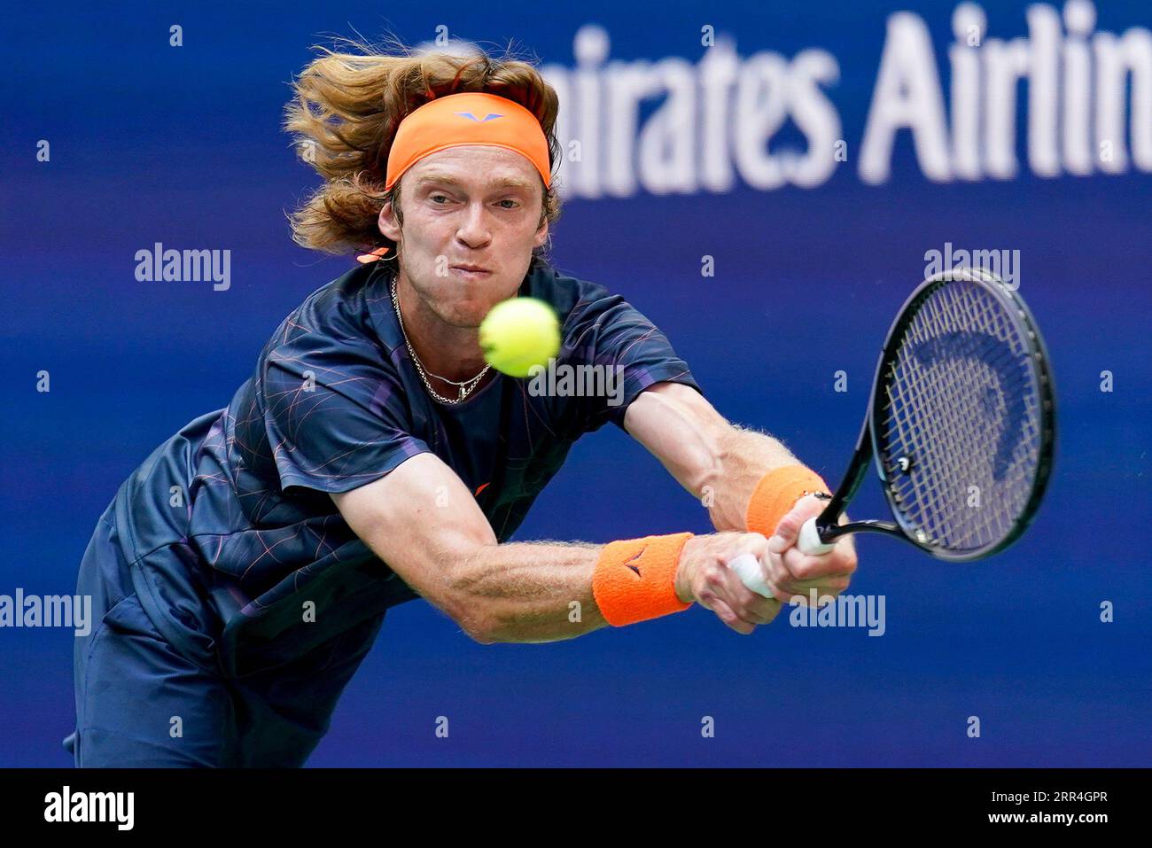 Andrey Rublev, of Russia, reaches for a shot from Daniil Medvedev, of Russia, during the quarterfinals of the U.S. Open tennis championships, Wednesday, Sept