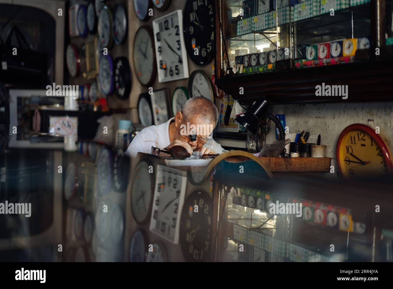 201207 KUALA LUMPUR, Dec. 7, 2020 Wai Wah, a watch repairer, works at Yoke Chong watch