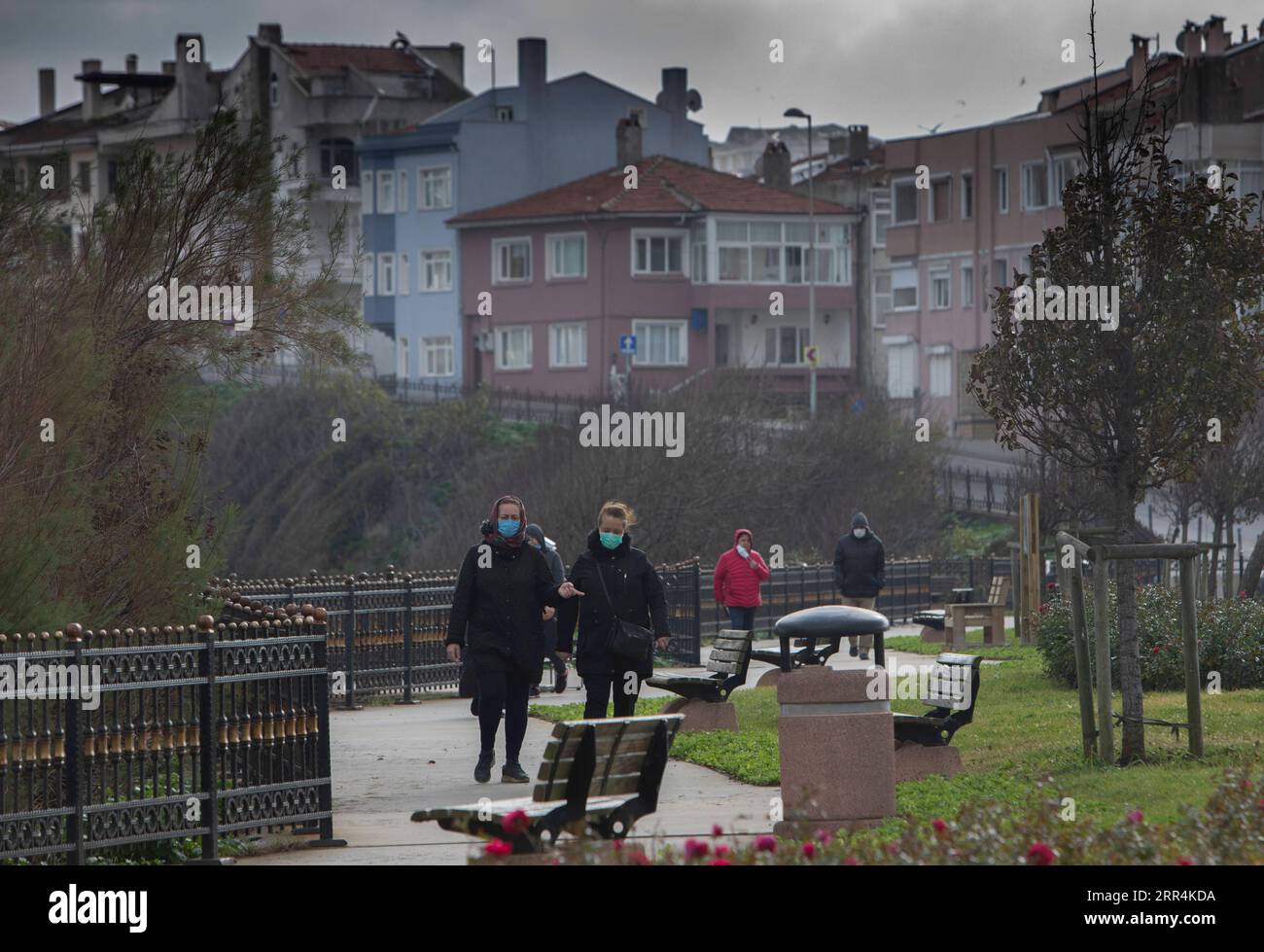 201207 -- SILE TURKEY, Dec. 7, 2020 -- People walk in Sile, a small fishing town some 70 km from Istanbul, Turkey, on Dec. 7, 2020. The concerns with the COVID-19 pandemic are causing more and more residents in Turkey s largest city Istanbul to move to the city s remote seaside districts along the shores of the Black Sea and the Marmara Sea. Photo by /Xinhua TO GO WITH Feature: Istanbul residents move to remote seaside areas over COVID-19 concerns TURKEY-SILE-ISTANBUL RESIDENTS-COVID-19-CONCERNS OsmanxOrsal PUBLICATIONxNOTxINxCHN Stock Photo