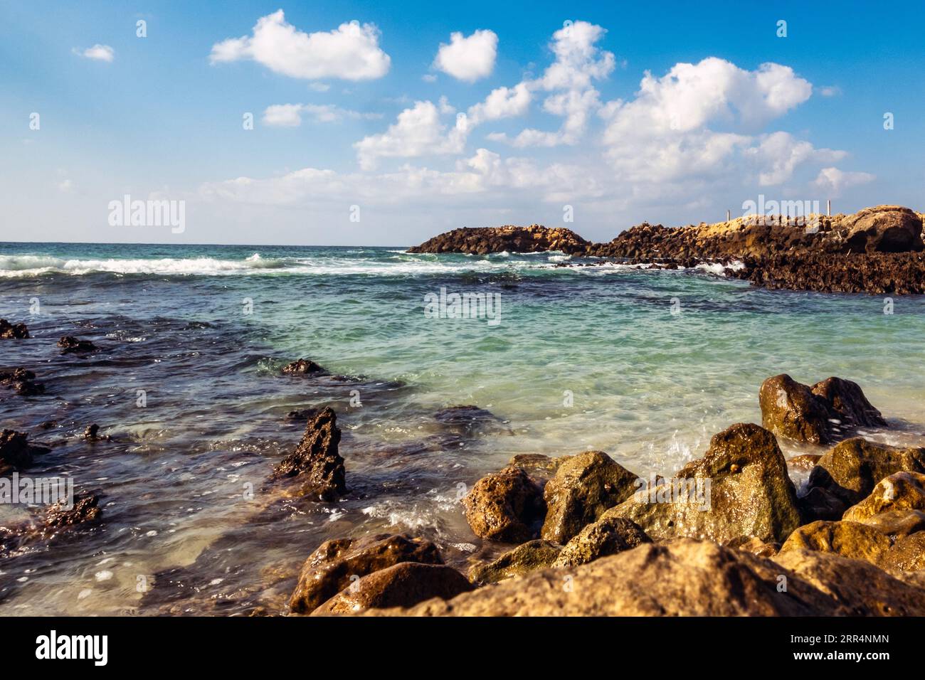Shuwaymiyah beach, Dhofar, Oman, a haven for both nature enthusiasts and beachgoers, offering a serene escape from the hustle and bustle of city life. Stock Photo
