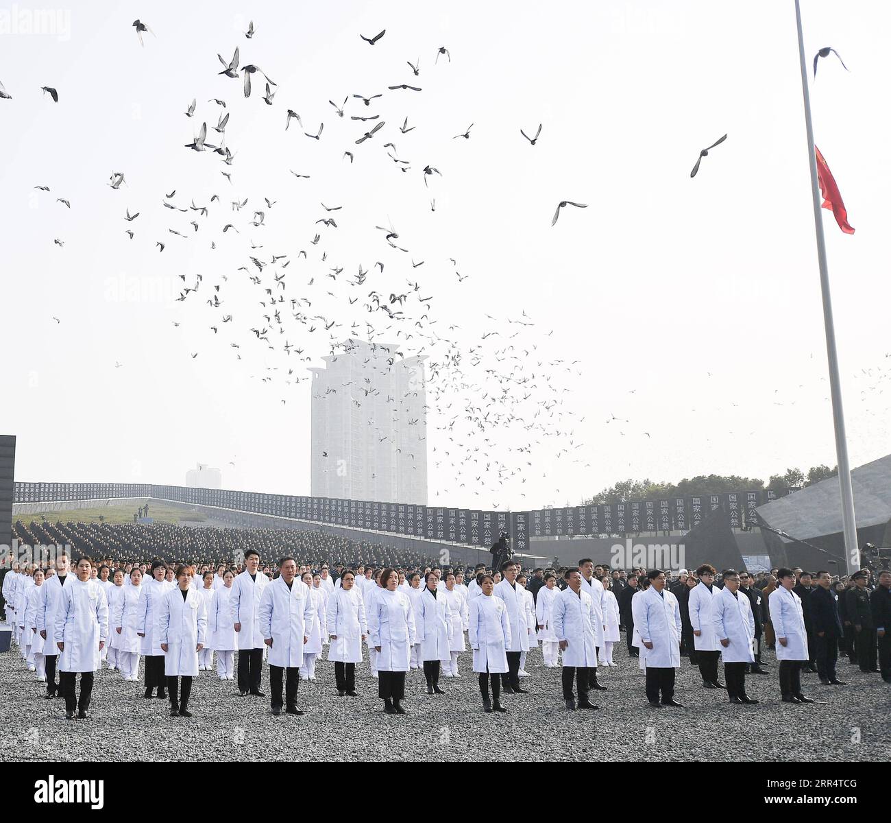 201213 -- NANJING, Dec. 13, 2020 -- Photo taken on Dec. 13, 2020 shows the national memorial ceremony for the Nanjing Massacre victims at the Memorial Hall of the Victims of the Nanjing Massacre by Japanese Invaders in Nanjing, capital of east China s Jiangsu Province.  CHINA-JIANGSU-NANJING MASSACRE VICTIMS-NATIONAL MEMORIAL CEREMONY CN LixXiang PUBLICATIONxNOTxINxCHN Stock Photo