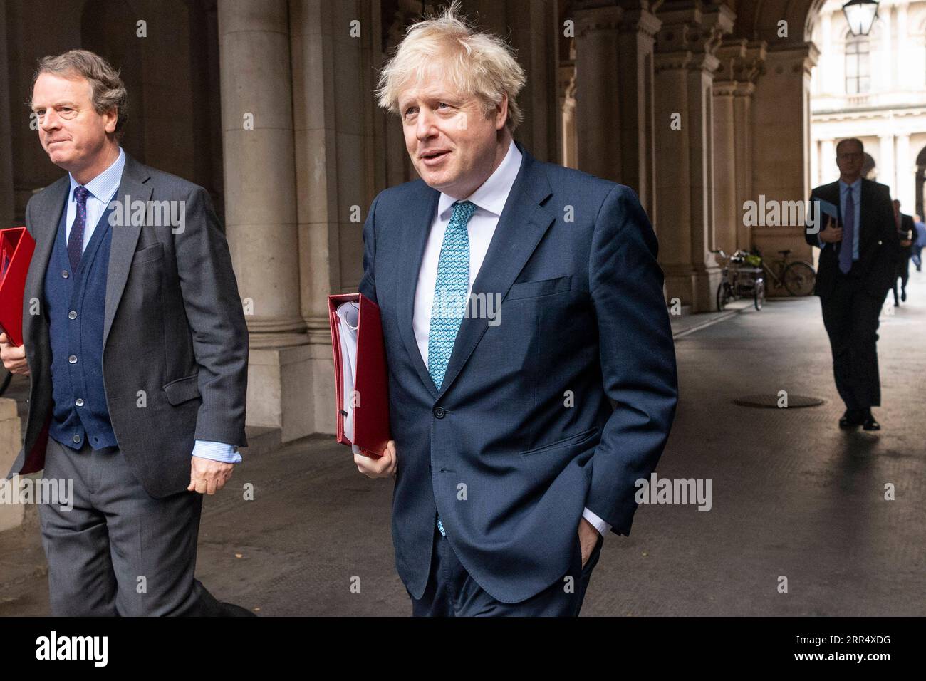 201215 -- LONDON, Dec. 15, 2020 -- British Prime Minister Boris Johnson R, Front returns to Downing Street after attending a cabinet meeting in London, Britain, on Dec. 15, 2020. London will move into Tier Three, the highest level in England s local coronavirus restriction tier system, from midnight on Wednesday, British Health Secretary Matt Hancock said Monday. Photo by /Xinhua BRITAIN-LONDON-COVID-19-TIER THREE RayxTang PUBLICATIONxNOTxINxCHN Stock Photo