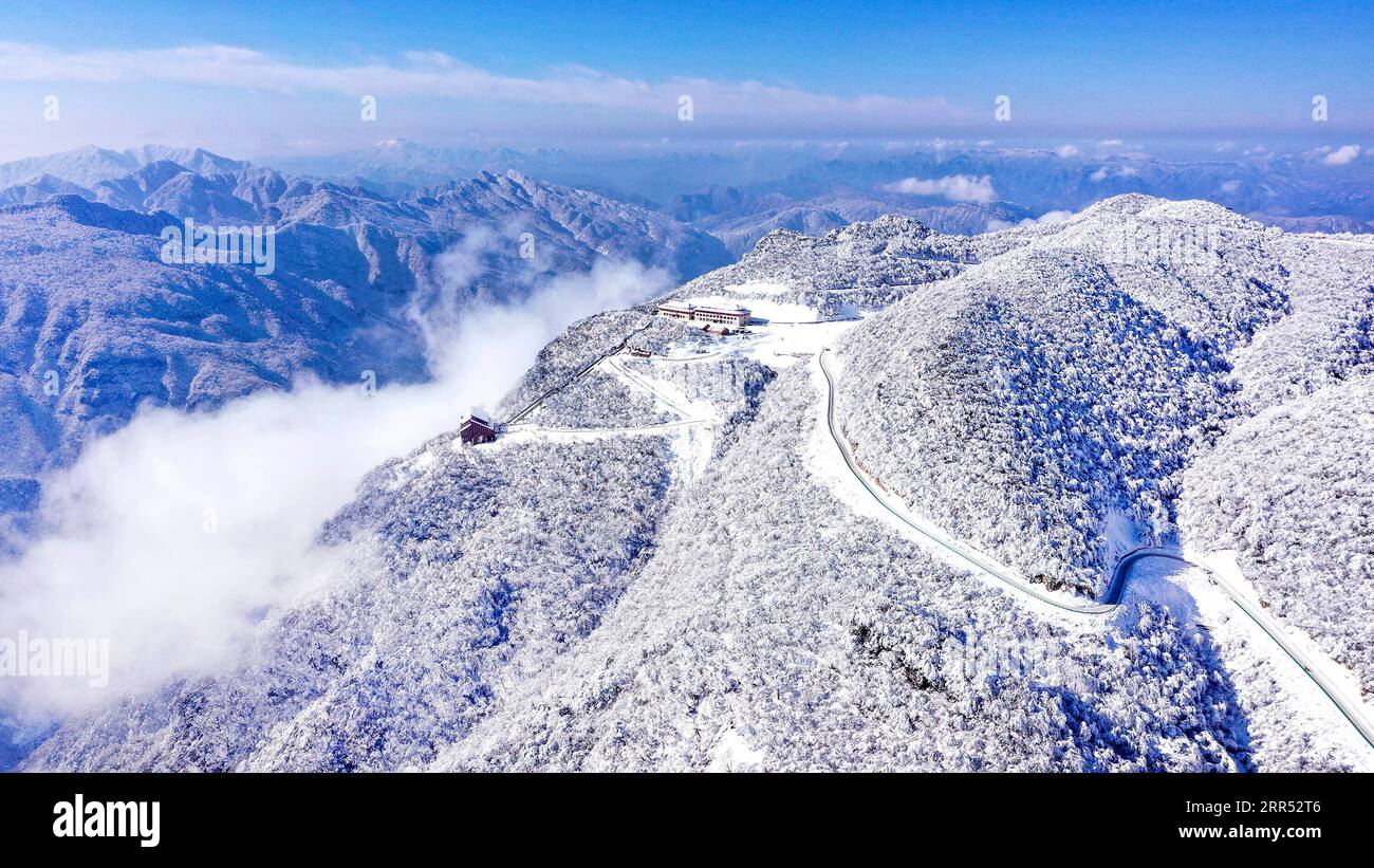 201220 -- HANZHONG, Dec. 20, 2020 -- Aerial photo taken on Dec. 20, 2020 shows the scenery in Longtoushan scenic area after a snowfall in Nanzheng District of Hanzhong, northwest China s Shaanxi Province.  CHINA-SHAANXI-HANZHONG-WINTER SCENERY CN TaoxMing PUBLICATIONxNOTxINxCHN Stock Photo