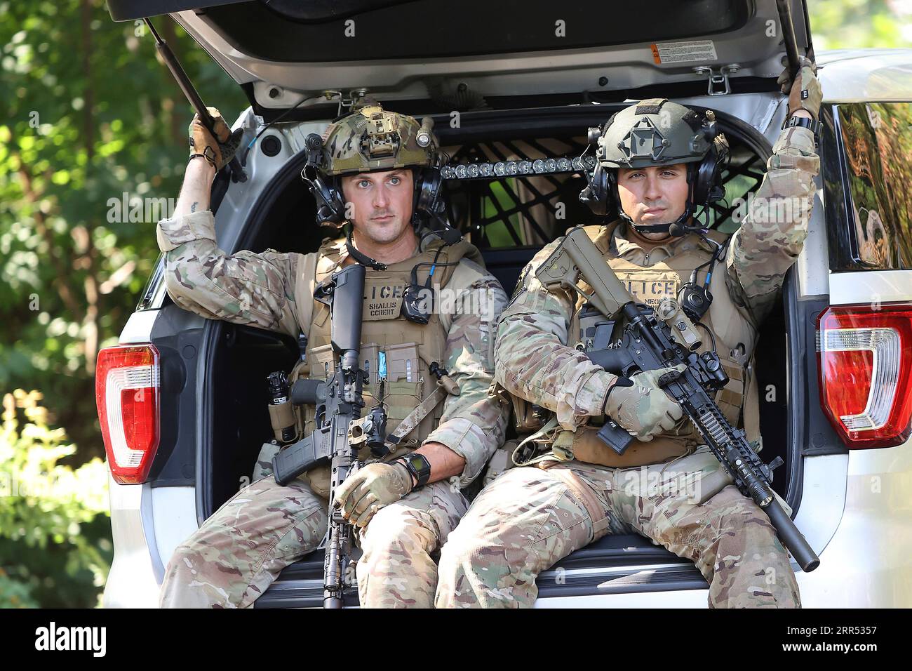 Heavily armed law enforcement officers move along Rt. 52 as the search  continues for Danilo Cavalcante in Pocopson Township, Pa., on Sunday, Sept.  3, 2023. Cavalcante escaped from the Chester County Prison.
