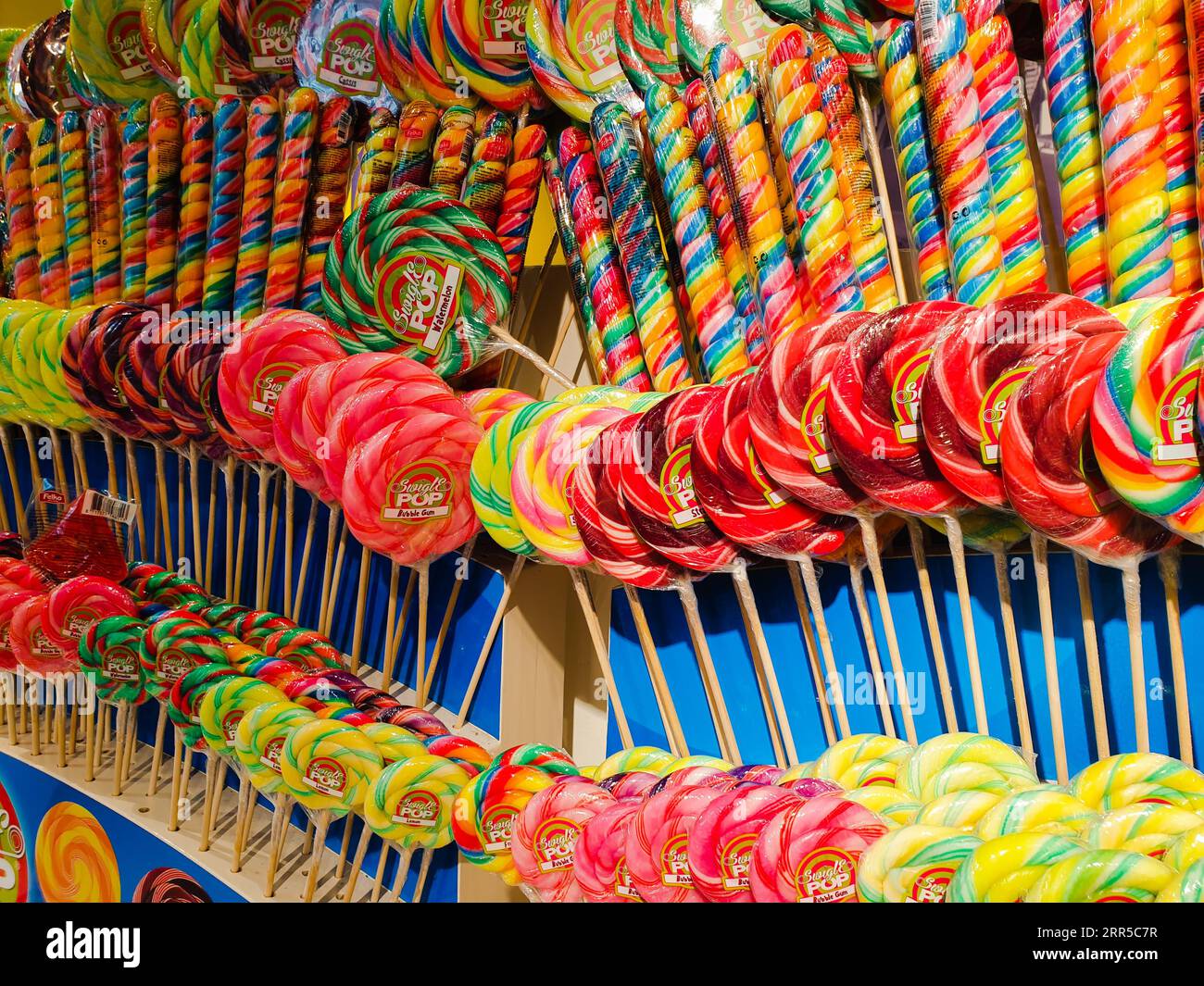 A row of colorful lollipops Stock Photo