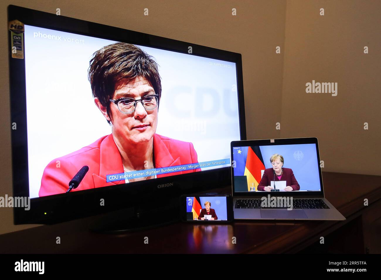 210115 -- BERLIN, Jan. 15, 2021 -- Photo taken in Berlin, Germany, on Jan. 15, 2021 shows the current leader of Germany s governing party Christian Democratic Union CDU Annegret Kramp-Karrenbauer L and German Chancellor Angela Merkel attending the CDU s digital party conference. The CDU began its digital party conference on Friday with a key agenda to elect a new party leader, which is widely seen as the first step towards selecting Chancellor Angela Merkel s successor.  GERMANY-BERLIN-CDU-DIGITAL PARTY CONFERENCE ShanxYuqi PUBLICATIONxNOTxINxCHN Stock Photo