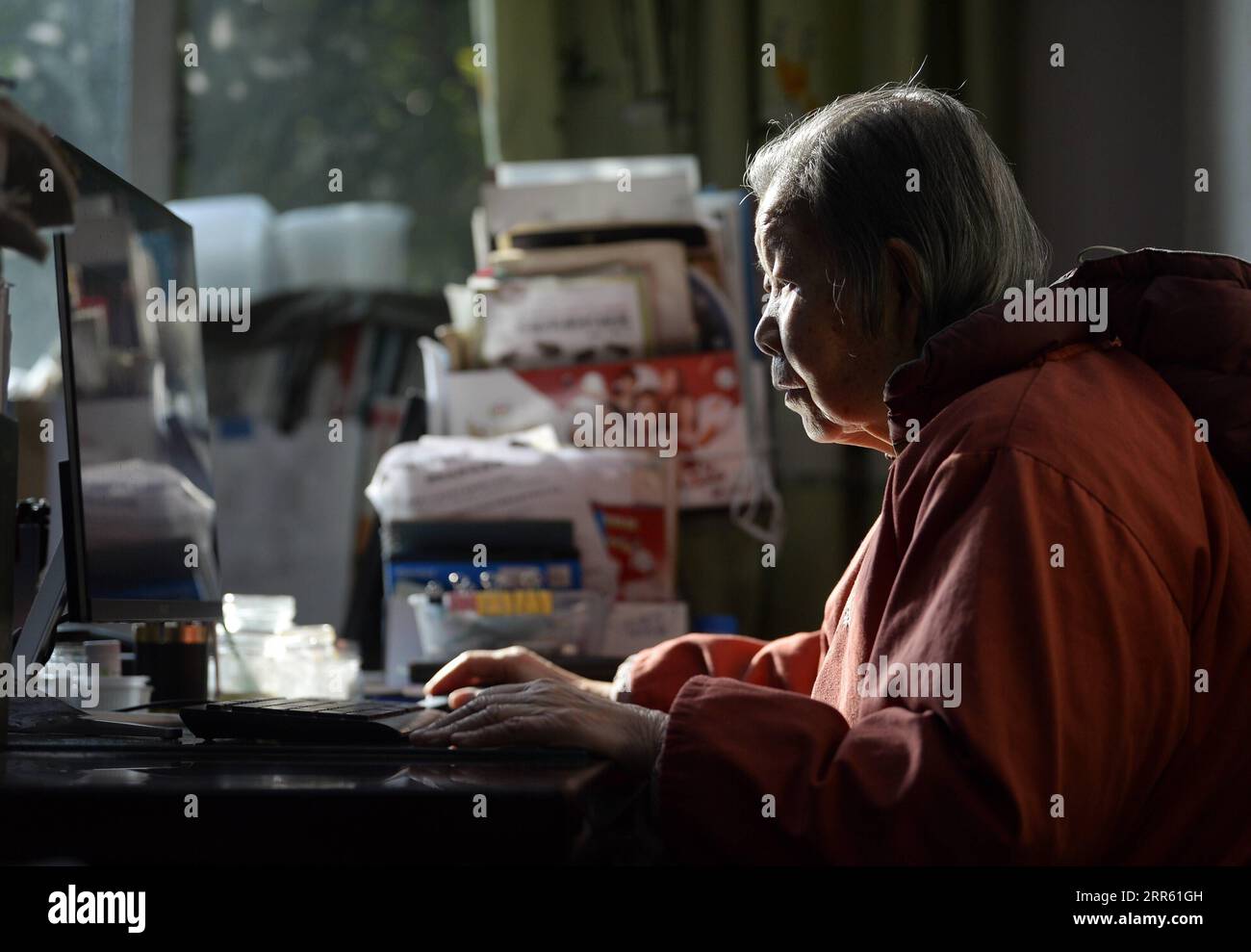 210121 -- CHENGDU, Jan. 21, 2021 -- Ye Changyuan works at the office in Chengdu, capital of southwest China s Sichuan Province, Jan. 15, 2021. Fei Liang, 84 years old, and Ye Changyuan, 82, are both researchers at the Chengdu Institute of Biology of the Chinese Academy of Sciences CAS. The elder couple have been doing herpetological research for 60 years. Due to the need of their work, they often had to stay in the wild for more than half a year. Among the 117,000 samples displayed inside the Herpetological Museum of the Chengdu Institute of Biology, nearly half of the samples were collected o Stock Photo
