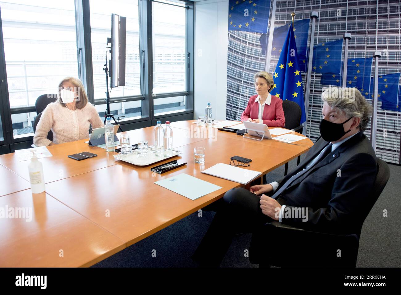 210201 -- BEIJING, Feb. 1, 2021 -- European Commission President Ursula von der Leyen C, European Commissioner for Health and Food Safety Stella Kyriakides L and European Commissioner for Internal Market Thierry Breton attend a video conference in Brussels, Belgium, Jan. 31, 2021. The s EU top health officials held discussions on Sunday with drug giants about rapid development and production of vaccines specially against the new variants of the coronavirus. /Handout via Xinhua XINHUA PHOTOS OF THE DAY EuropeanxUnion PUBLICATIONxNOTxINxCHN Stock Photo