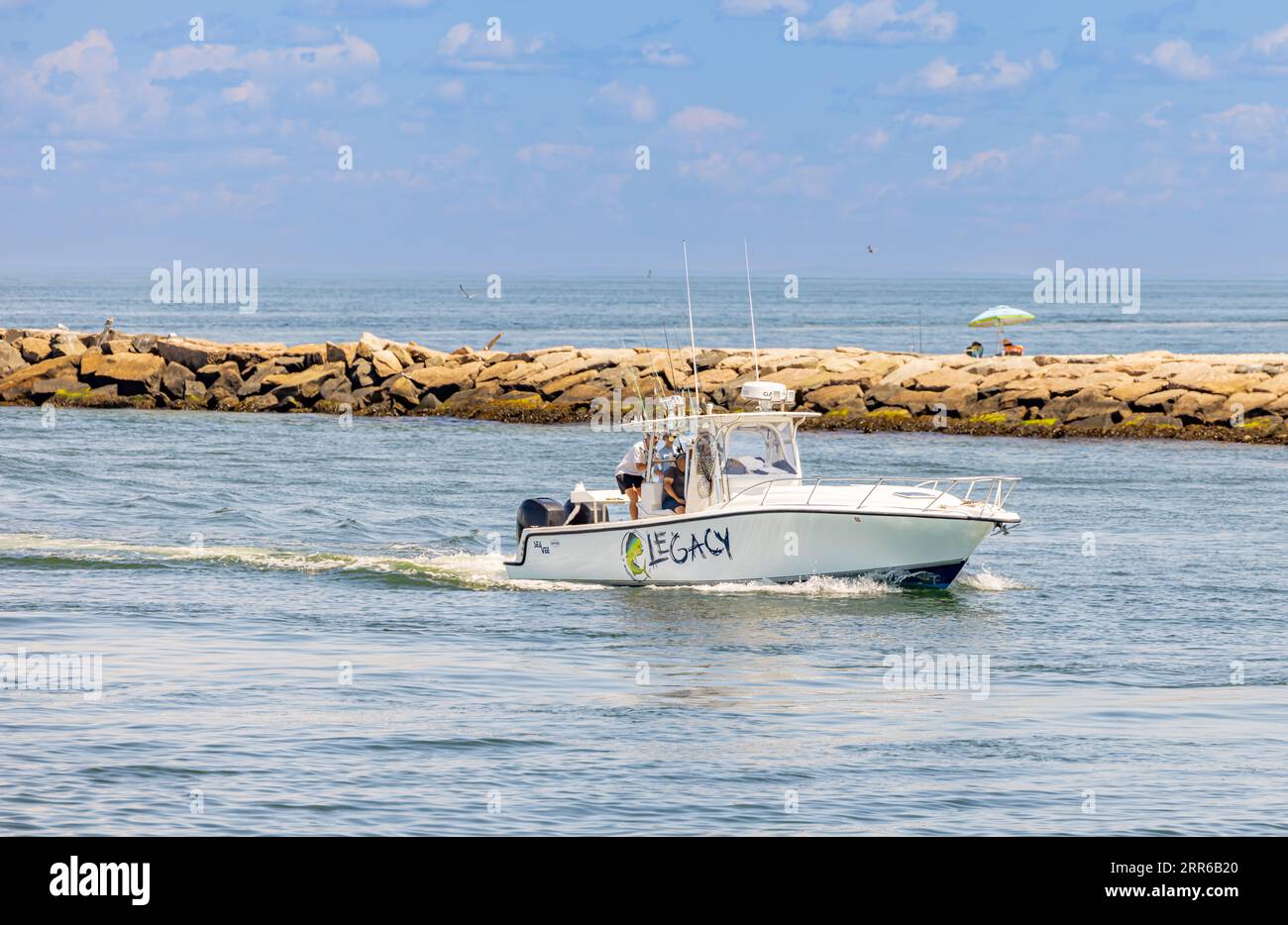 boat called the lsgacy coming into montauk Stock Photo