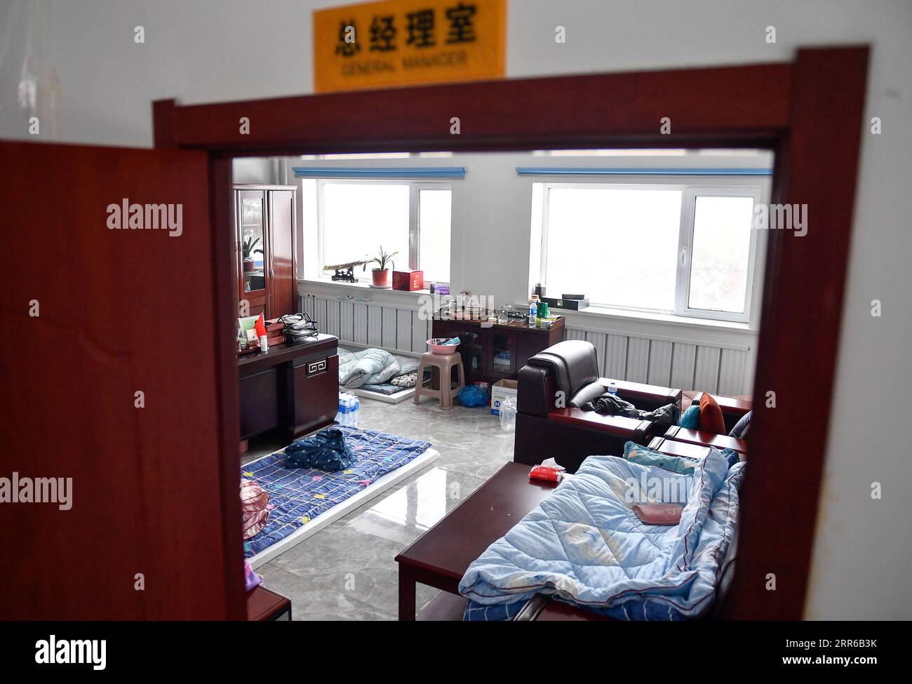 210203 -- TONGHUA, Feb. 3, 2021 -- Zhao Hongxia s office is seen converted into a temporary dormitory in Jiahe Catering Company in Tonghua City of northeast China s Jilin Province, Jan. 21, 2021. The city is slowing down to curb the pandemic, but we re not closing up. Instead, we re busier than ever, said Zhao Hongxia, general manager of Jiahe Catering Company. The company was originally a boxed meal supplier for primary and secondary schools in Tonghua City. Since the COVID-19 outbreak in Tonghua, the company has accepted a new task of providing meals to front-line staff and people under quar Stock Photo