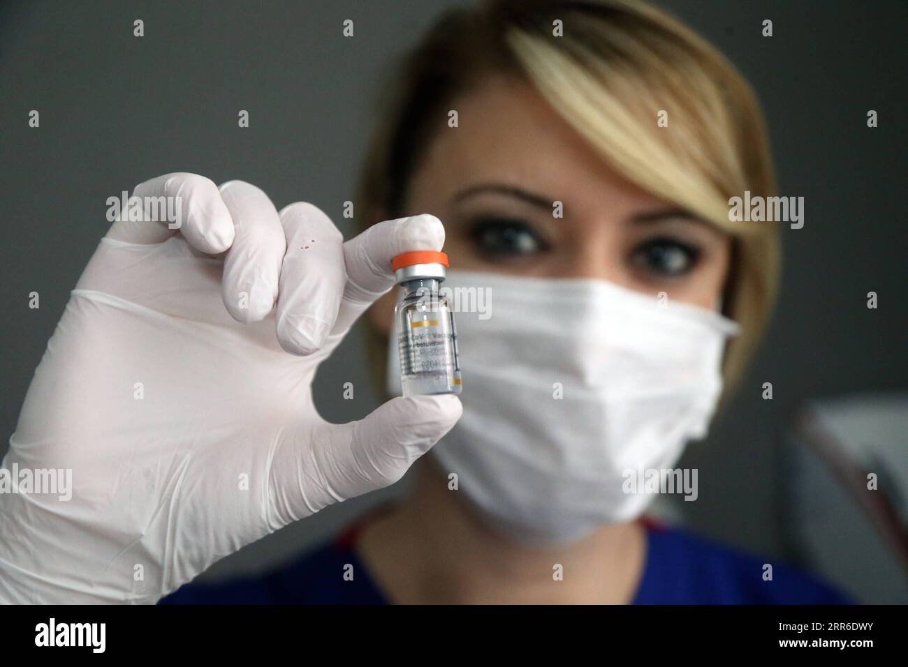 210208 -- ANKARA, Feb. 8, 2021 -- A nurse shows a vial of the COVID-19 vaccine at a health center in Ankara, Turkey, on Feb. 8, 2021. Turkey on Monday reported 8,103 new COVID-19 cases, including 632 symptomatic patients, as the total number of positive cases in the country reached 2,539,559, according to its health ministry. Photo by /Xinhua TURKEY-ANKARA-COVID-19-VACCINATION MustafaxKaya PUBLICATIONxNOTxINxCHN Stock Photo