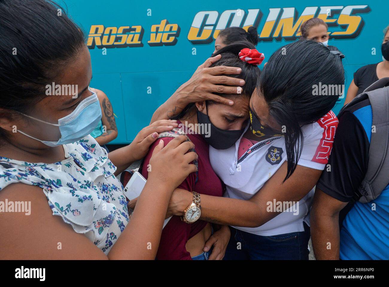 210224 -- GUAYAQUIL, Feb. 24, 2021 -- Relatives of inmates react outside of the prison where riots broke out in Guayaquil, Ecuador, Feb. 23, 2021. At least 67 prisoners died on Tuesday during violent riots in three Ecuadorian prisons due to clashes between rival gangs, Director of the Comprehensive Care Service for Adults Deprived of Liberty Edmundo Moncayo said at a press conference at the government palace in Quito. Str/Xinhua ECUADOR-GUAYAQUIL-JAIL-RIOT Stringer PUBLICATIONxNOTxINxCHN Stock Photo