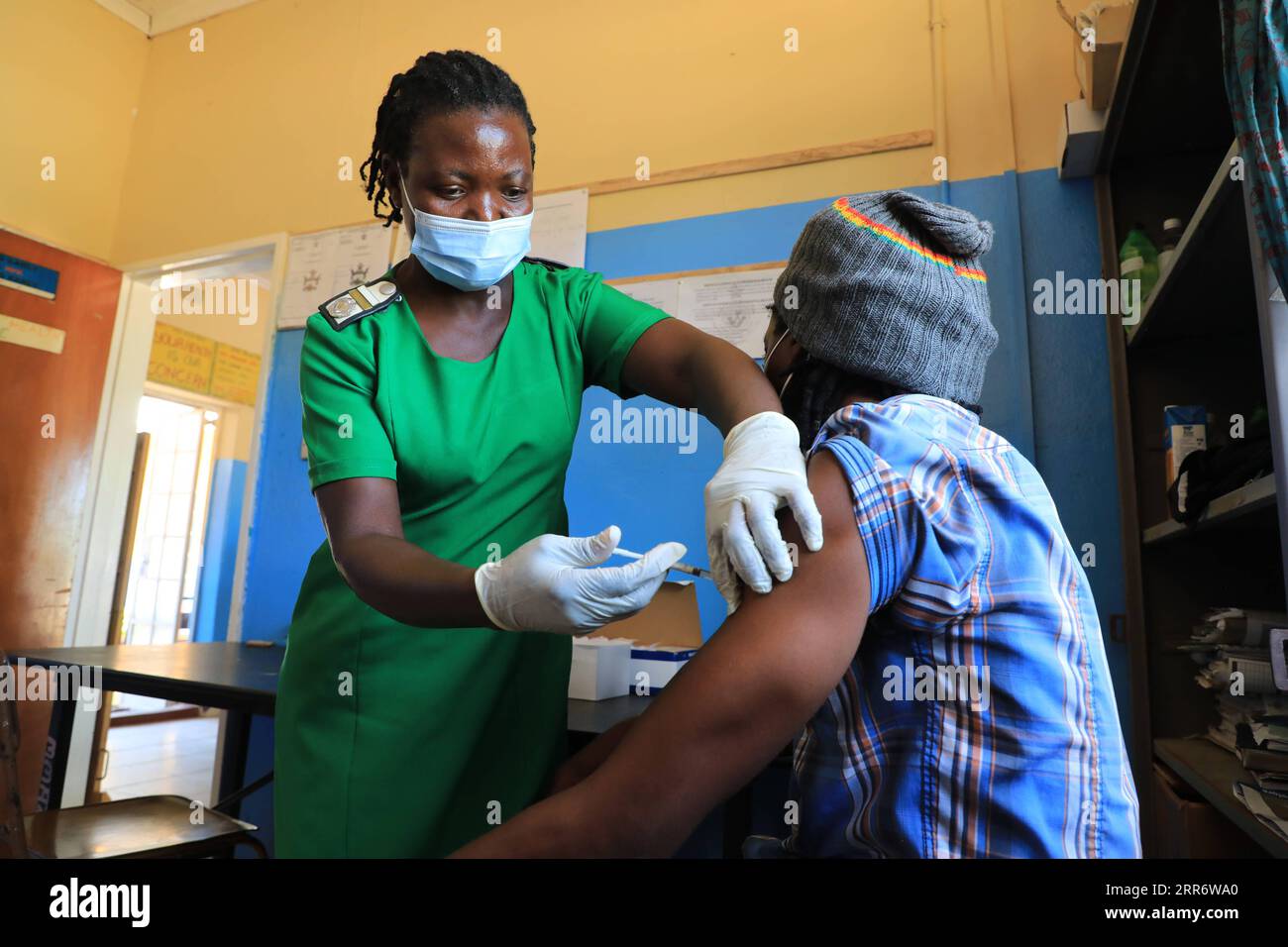 210302 -- MIDLANDS, March 2, 2021 -- A man gets a jab of Sinopharm vaccine at a hospital in Gokwe, Midlands Province, Zimbabwe, on Feb. 22, 2021. Zimbabwean President Emmerson Mnangagwa on Monday lauded China for donating COVID-19 vaccines to Zimbabwe as the country embarks on its inoculation program. Photo by /Xinhua ZIMBABWE-PRESIDENT-CHINA-AIDED VACCINES Wanda PUBLICATIONxNOTxINxCHN Stock Photo