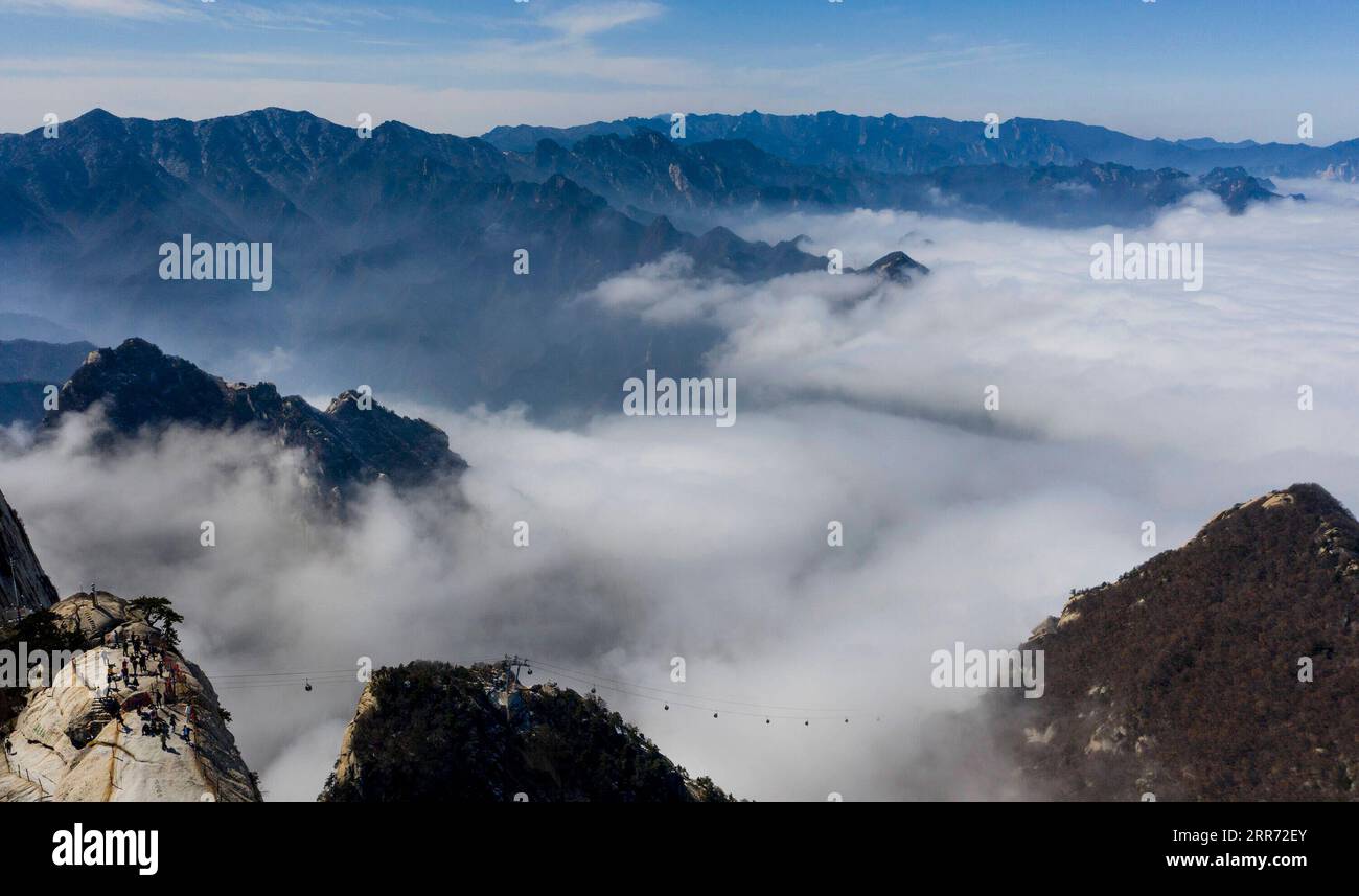 210309 -- HUASHAN, March 9, 2021 -- Aerial photo taken on March 9, 2021 shows the scenery of Mount Huashan in northwest China s Shaanxi Province.  CHINA-SHAANXI-HUASHAN-SCENERY CN TaoxMing PUBLICATIONxNOTxINxCHN Stock Photo