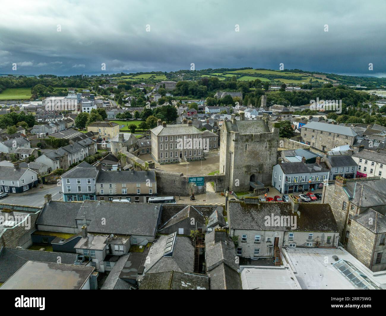 Aerial view of Roscrea castle and town in Central Ireland with tower house keep, enclosing walls with circular tower and garden Stock Photo