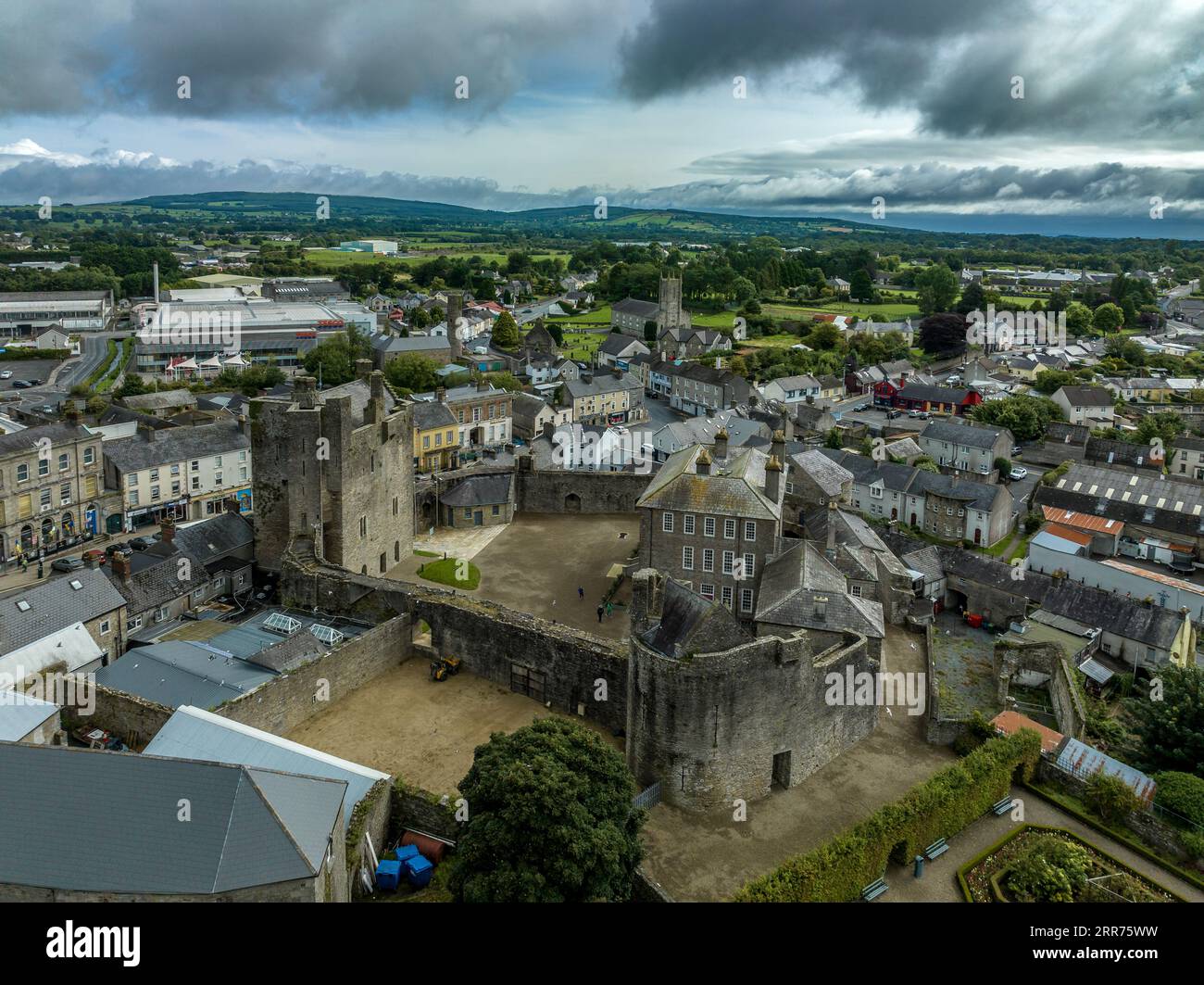 Aerial view of Roscrea castle and town in Central Ireland with tower house keep, enclosing walls with circular tower and garden Stock Photo