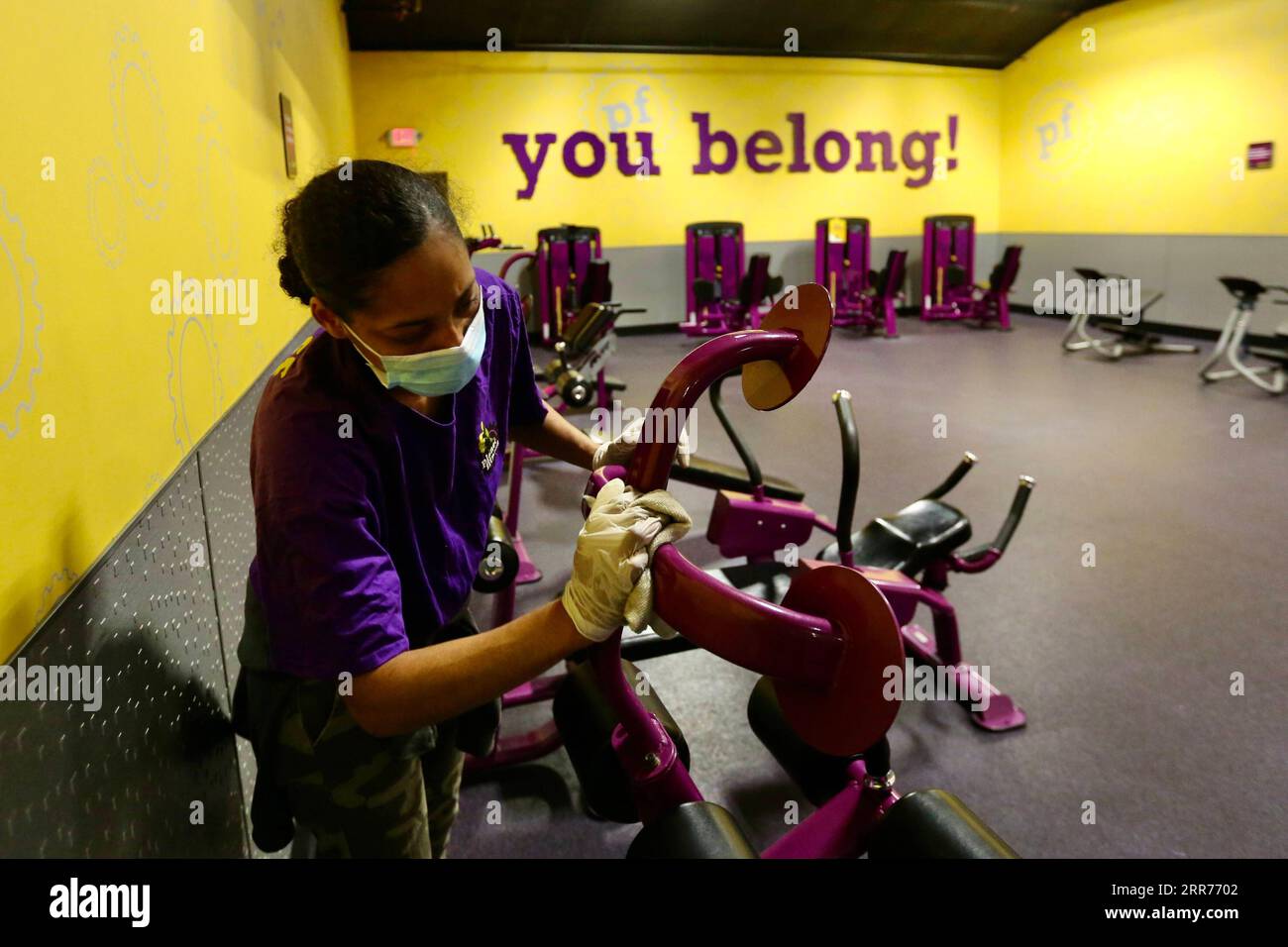 210316 -- LOS ANGELES, March 16, 2021 -- Staff members of Planet Fitness  prepare for reopening to the public in Inglewood, Los Angeles County,  California, the United States, March 15, 2021. Gyms