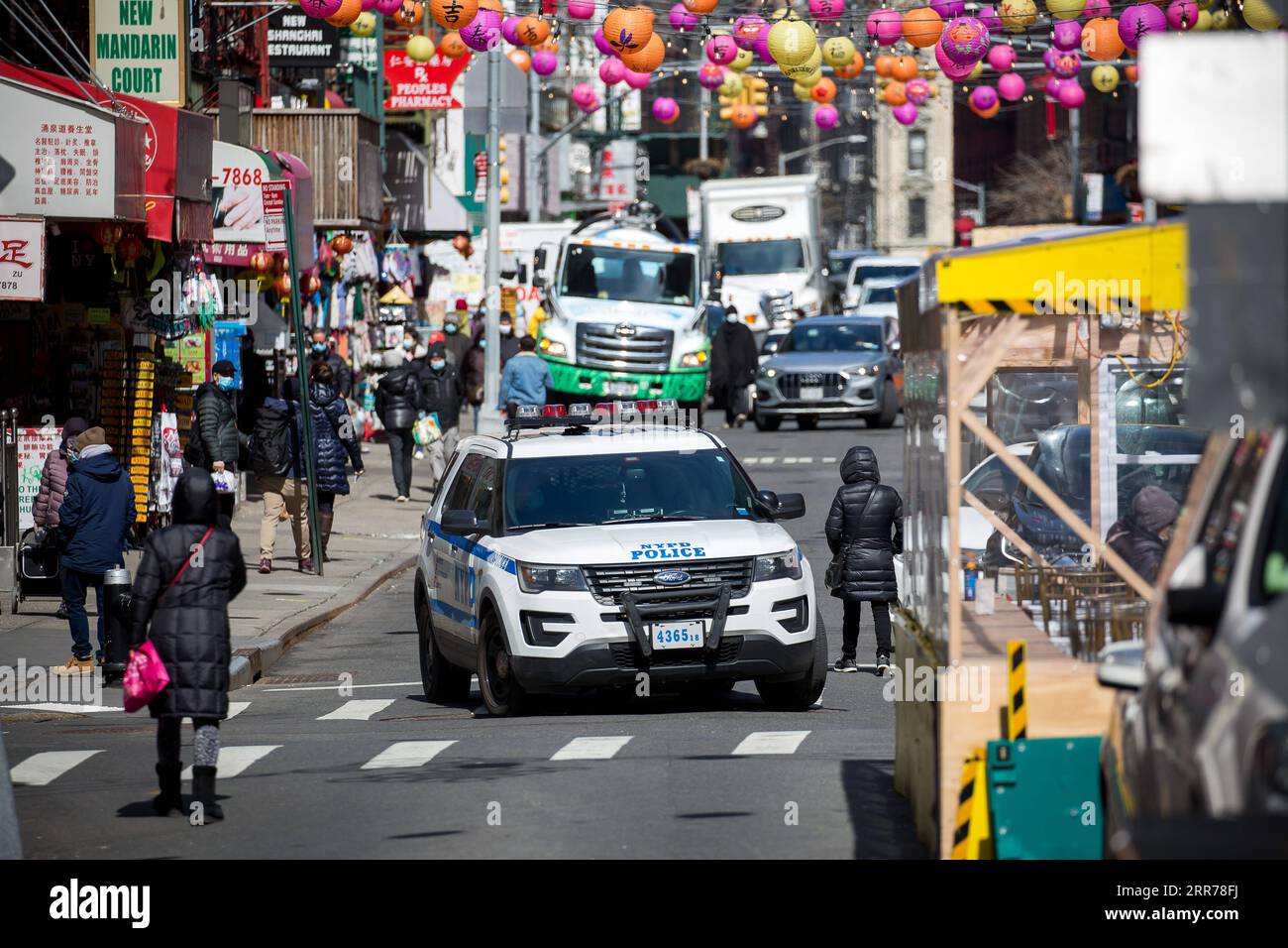 210320 -- NEW YORK, March 20, 2021 -- A police car is seen patrolling in Chinatown of New York, the United States, March 19, 2021. New York Police Department has stepped up security for the Asian neighborhoods across New York City as precaution and a direct response to the Atlanta shootings, in which eight people, six of whom were Asian and two were white, were killed. Photo by /Xinhua U.S.-NEW YORK-ASIAN NEIGHBORHOODS-SECURITY MichaelxNagle PUBLICATIONxNOTxINxCHN Stock Photo