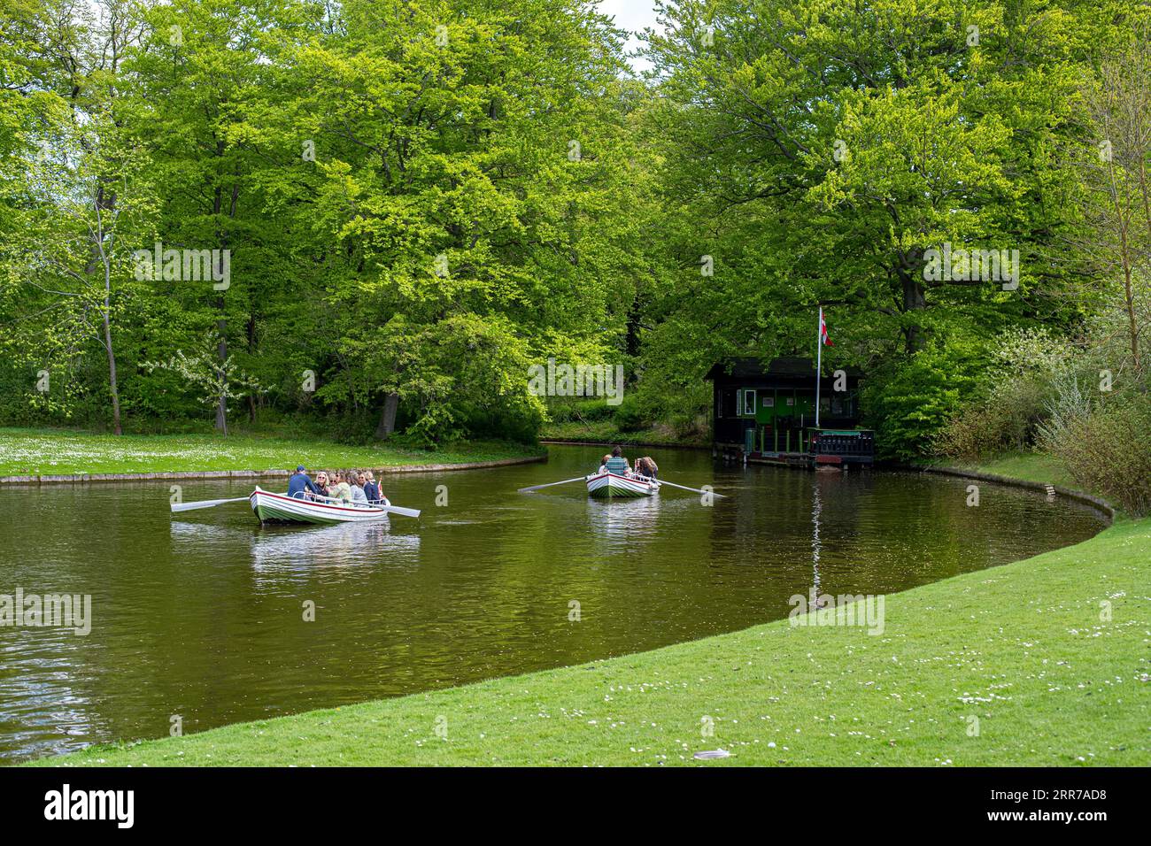 Frederiksberg, Denmark, May 07, 2022: People in a rowboat in Frederiksberg Gardens Stock Photo