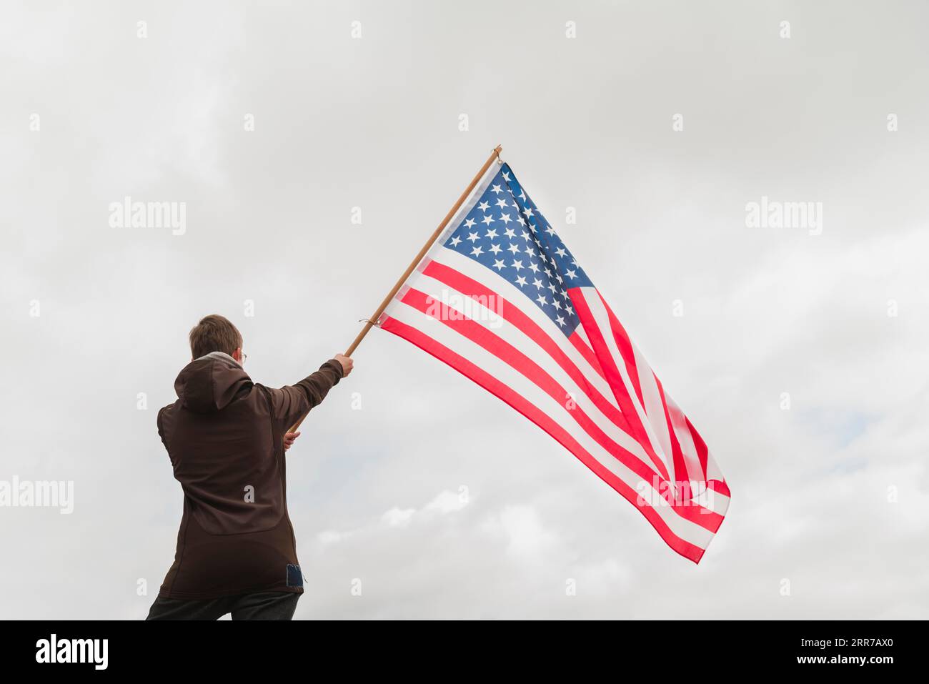 Man waving american flag Stock Photo Alamy