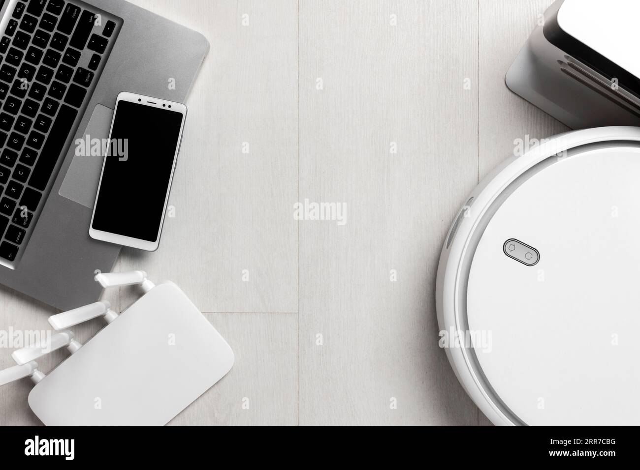 Top view wi fi router with vacuum cleaner smart devices Stock Photo - Alamy