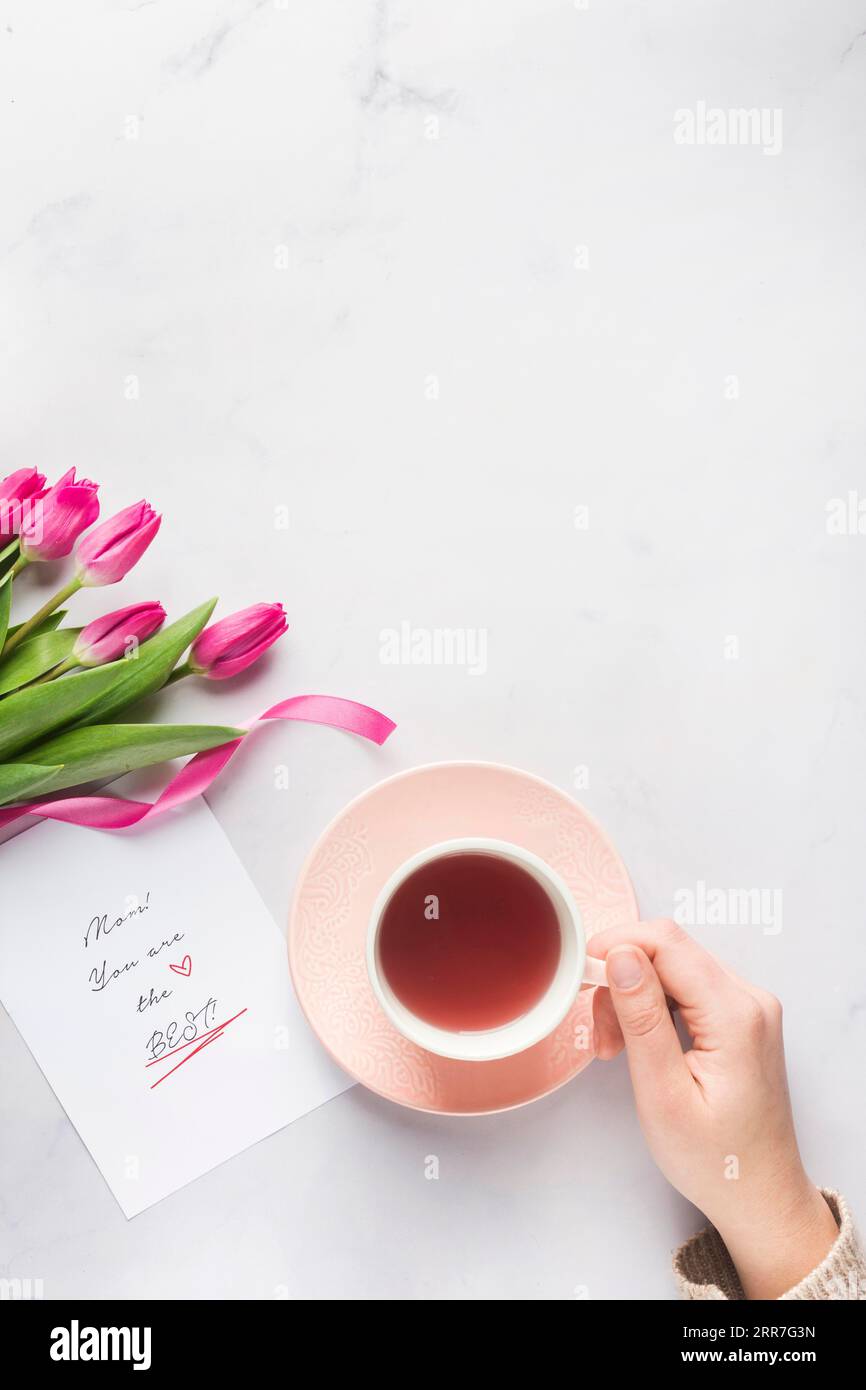 Hand Over Tea Hand holding tea hi-res stock photography and images - Alamy