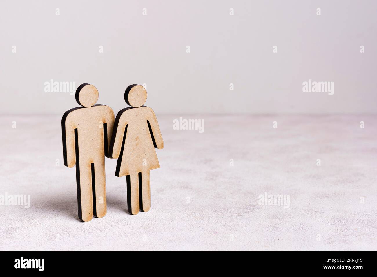 Cardboard man woman equality concept with copy space Stock Photo