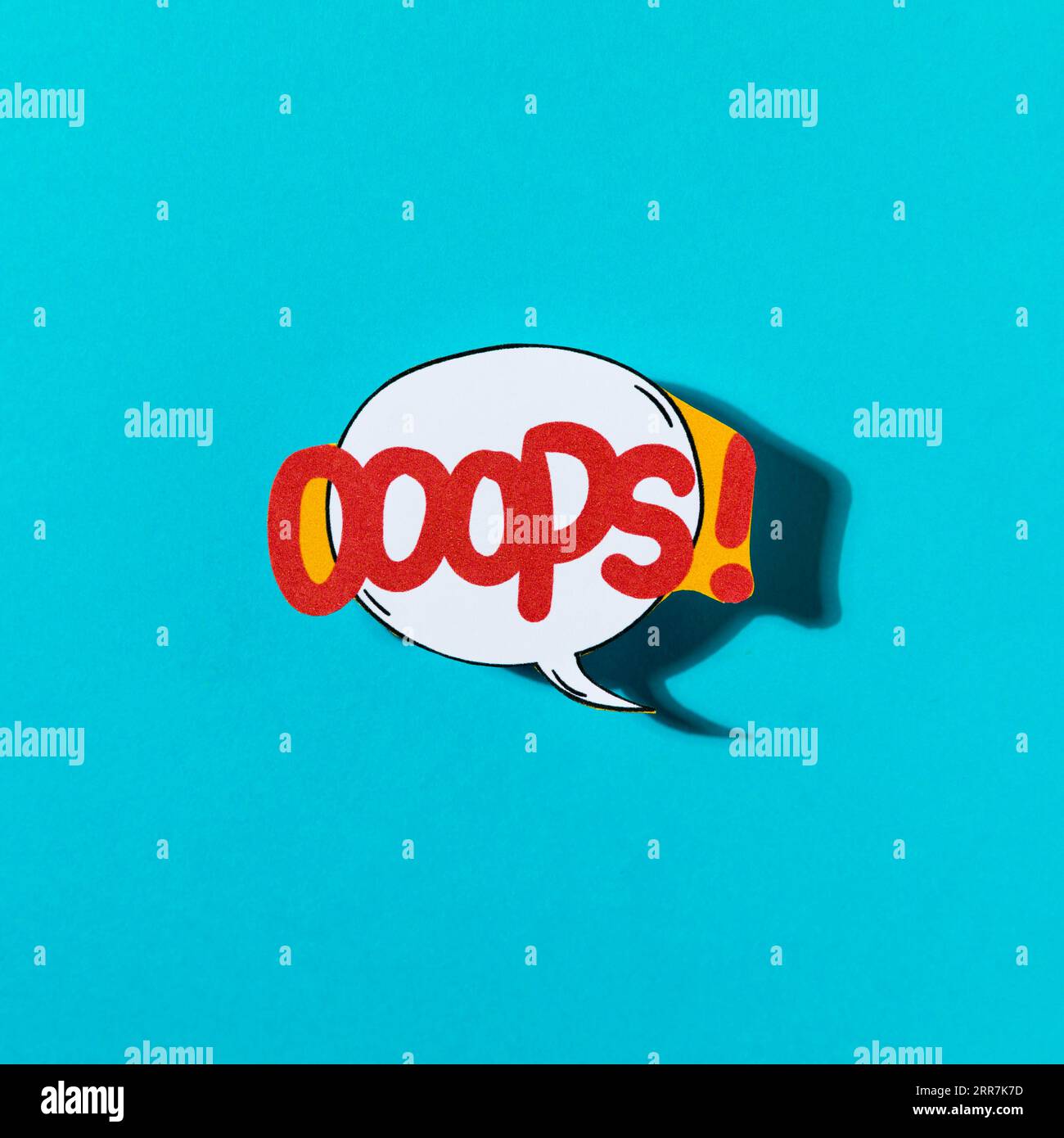Pop art comic design oops speech bubble blue backdrop Stock Photo - Alamy