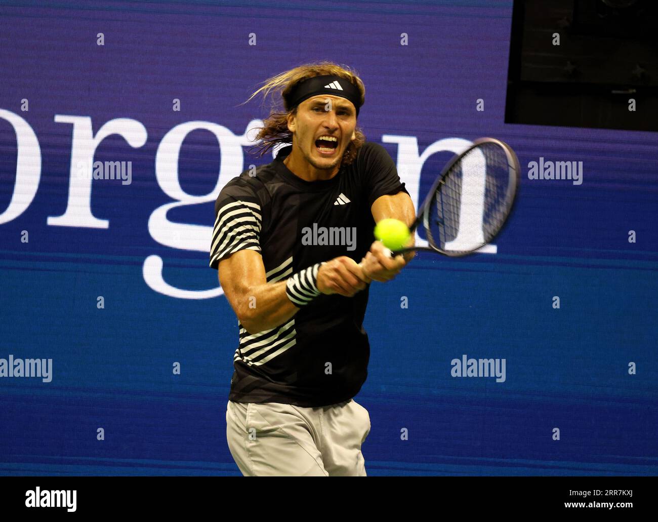 New York, United States. 05th Sep, 2023. Alexander Zverev strokes a return to Carlos Alcaraz during their quarterfinal match at the US Open. Photography by Credit: Adam Stoltman/Alamy Live News Stock Photo